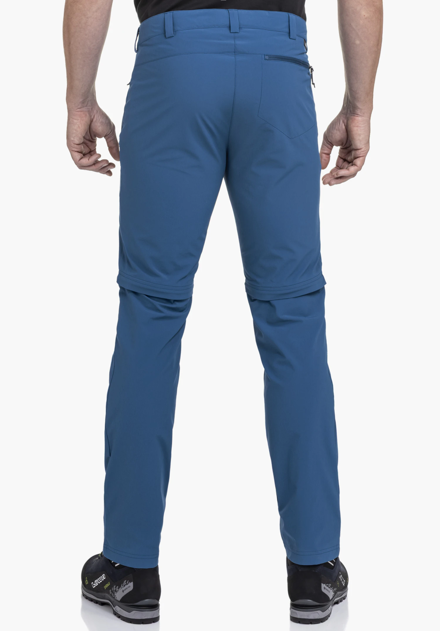 Pants Folkstone Zip Off in blauw, achteraanzicht op een model tegen een neutrale achtergrond met zichtbaar Schöffel-logo.