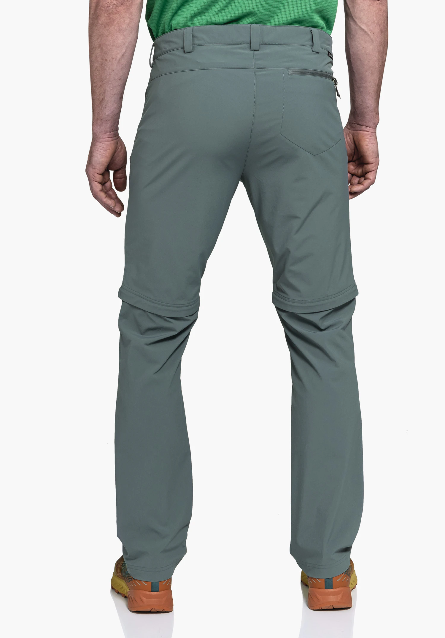 Pants Folkstone Zip Off toont de grijze wandelbroek in achteraanzicht op een model, met focus op de afritsfunctie en het Schöffel-logo tegen een neutrale achtergrond.