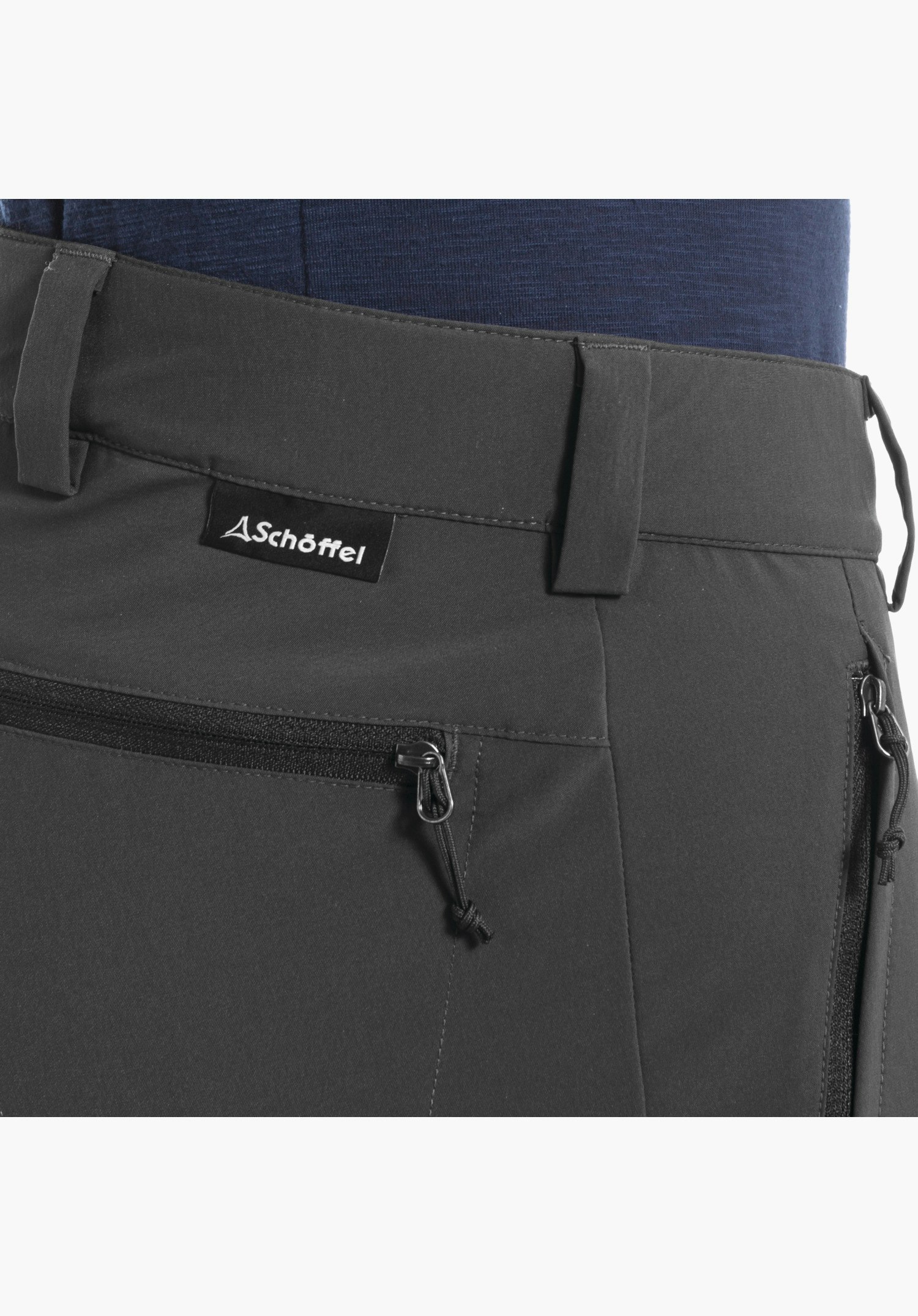 Pants Folkstone Zip Off, waistband with belt loops, Schöffel logo label and zip pockets on the grey material, close-up against a white/neutral background.