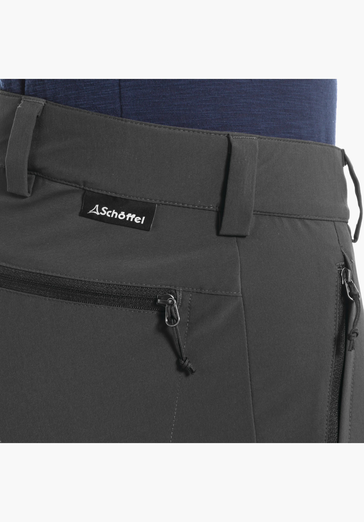 Pants Folkstone Zip Off, waistband with belt loops, Schöffel logo label and zip pockets on the grey material, close-up against a white/neutral background.