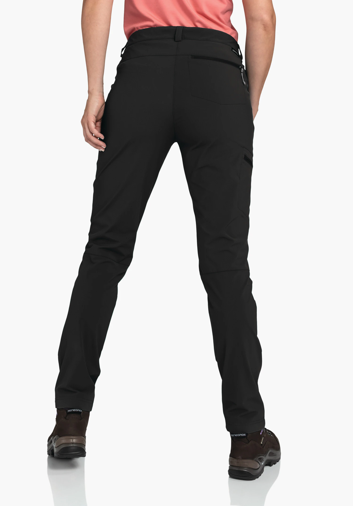 Pants Ascona in the back view. The model stands in the black trousers against a neutral background, with a small Schöffel logo visible on the back waistband.