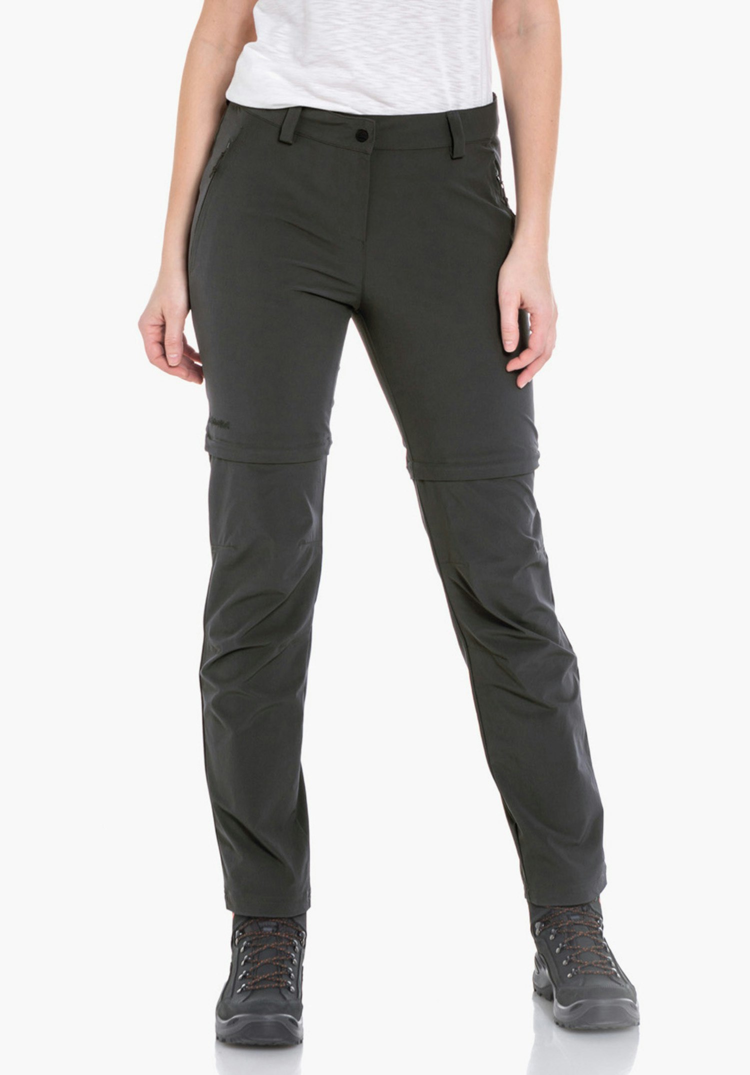 Pants Ascona Zip Off women’s trousers — woman stands front-facing with hands relaxed at sides; wearing a bright white T-shirt and black trousers; neutral white background.