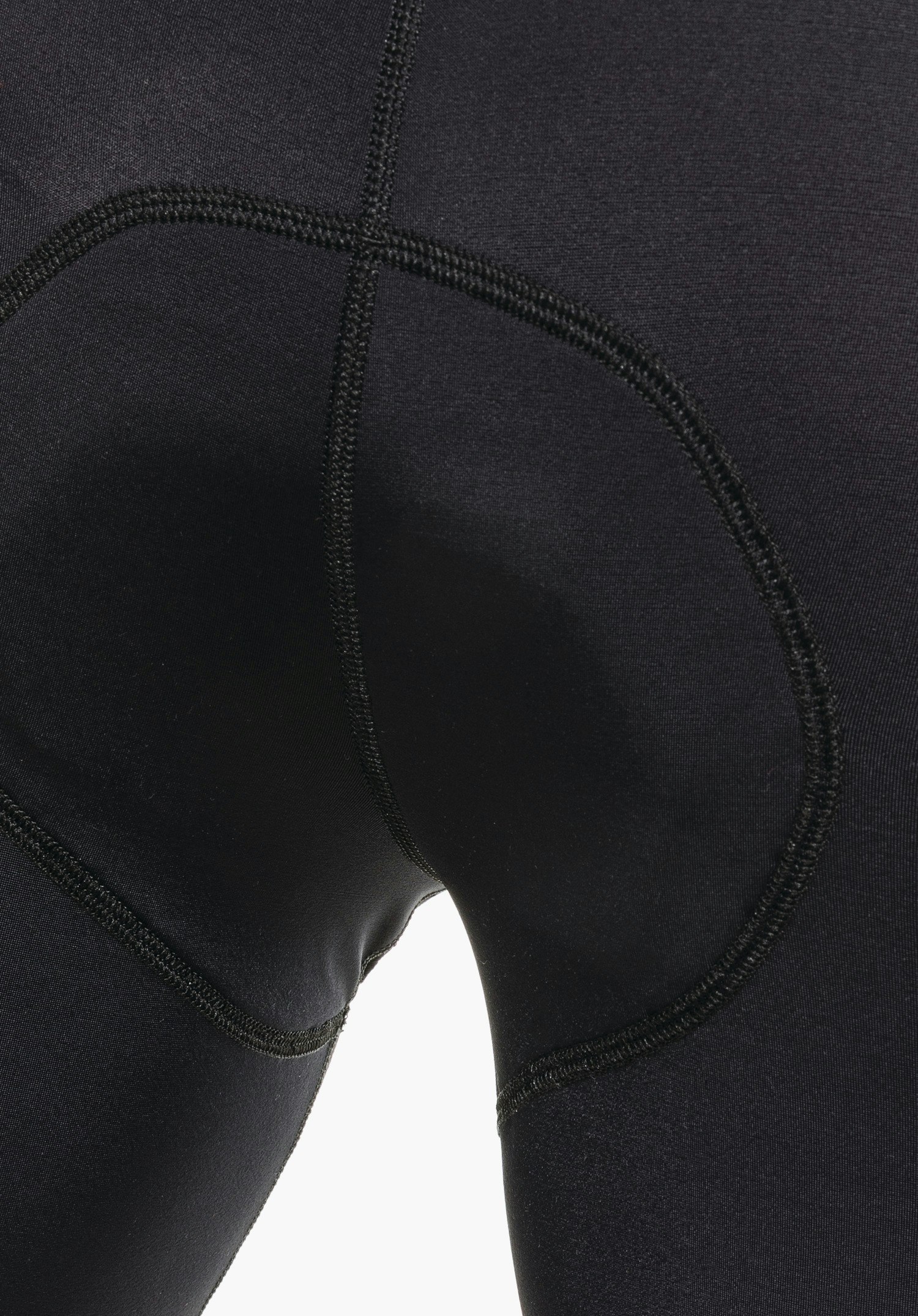 Skin Pants 8h M, detail view of the integrated seat pad structure in the black technical fabric, close-up against a white background.