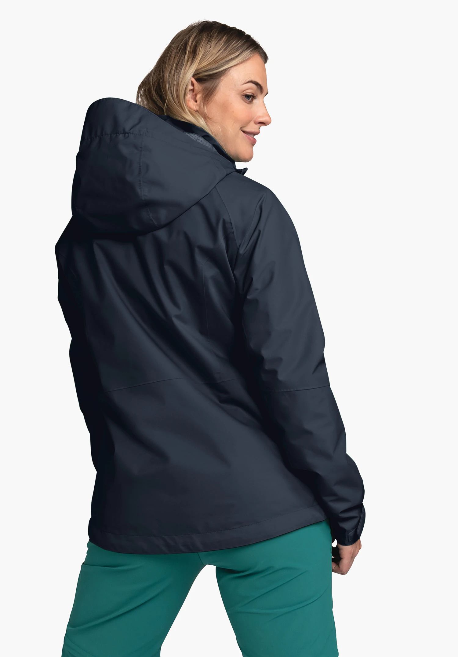 Jacket Easy XT L in blue, worn by a model in a back view. The model stands sideways looking over her shoulder against a neutral background.