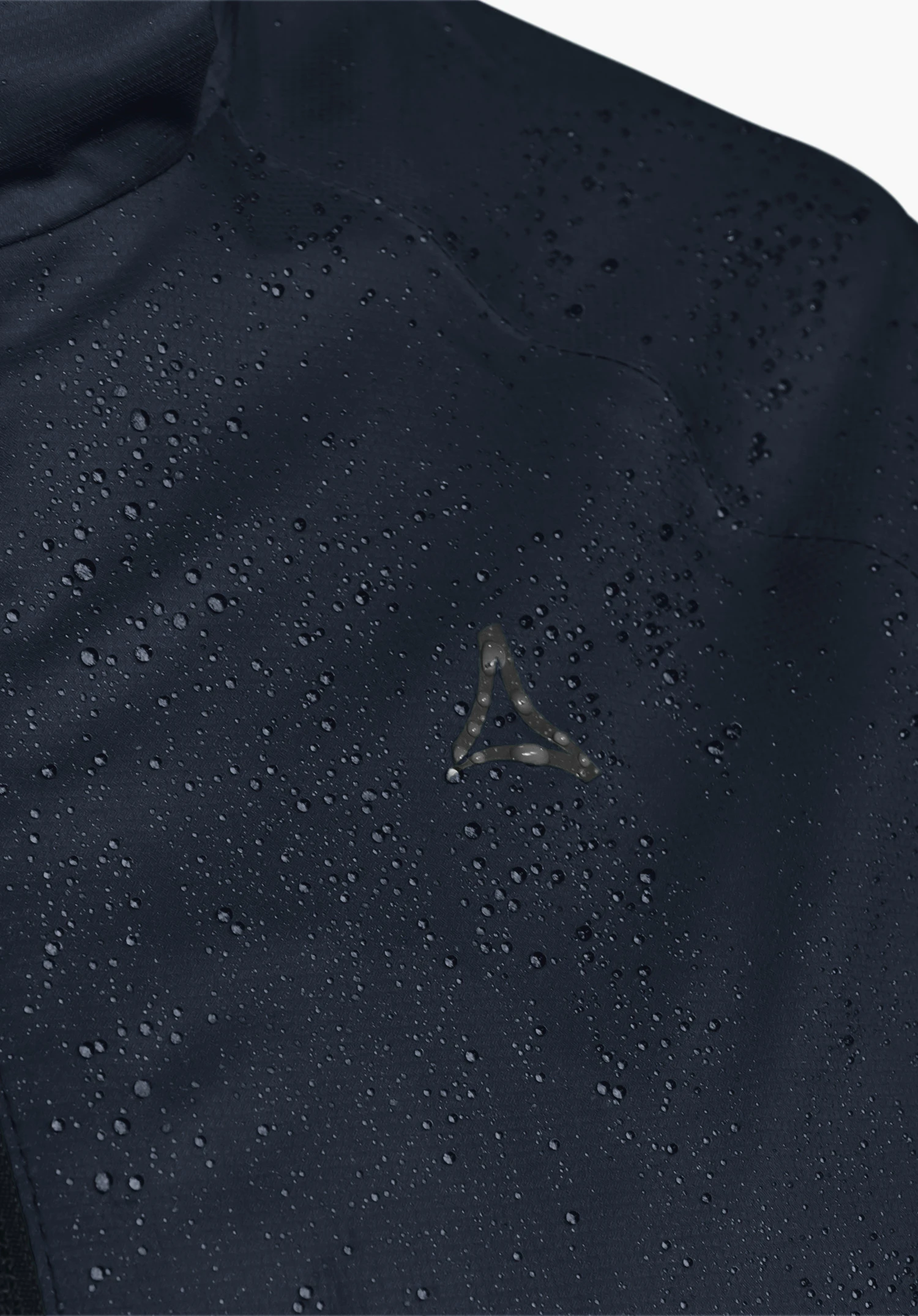 Jacket Easy XT L detail view of the blue fabric with beading water droplets, the front zip, and the Schöffel-Logo. Close-up against a white/neutral background.