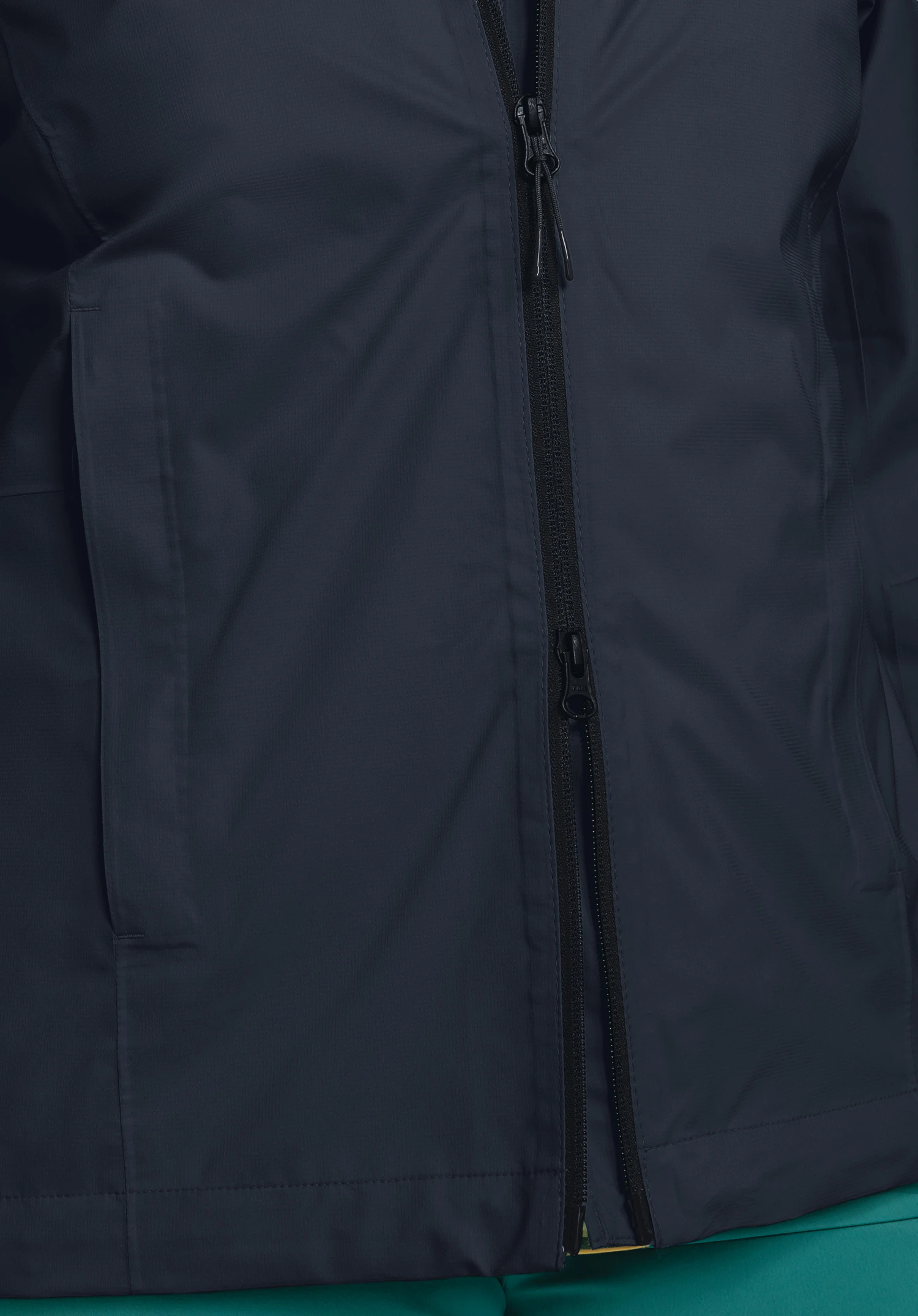 Jacket Easy XT L presents the black two-way zip and the fine blue fabric structure, close-up against a white/neutral background.