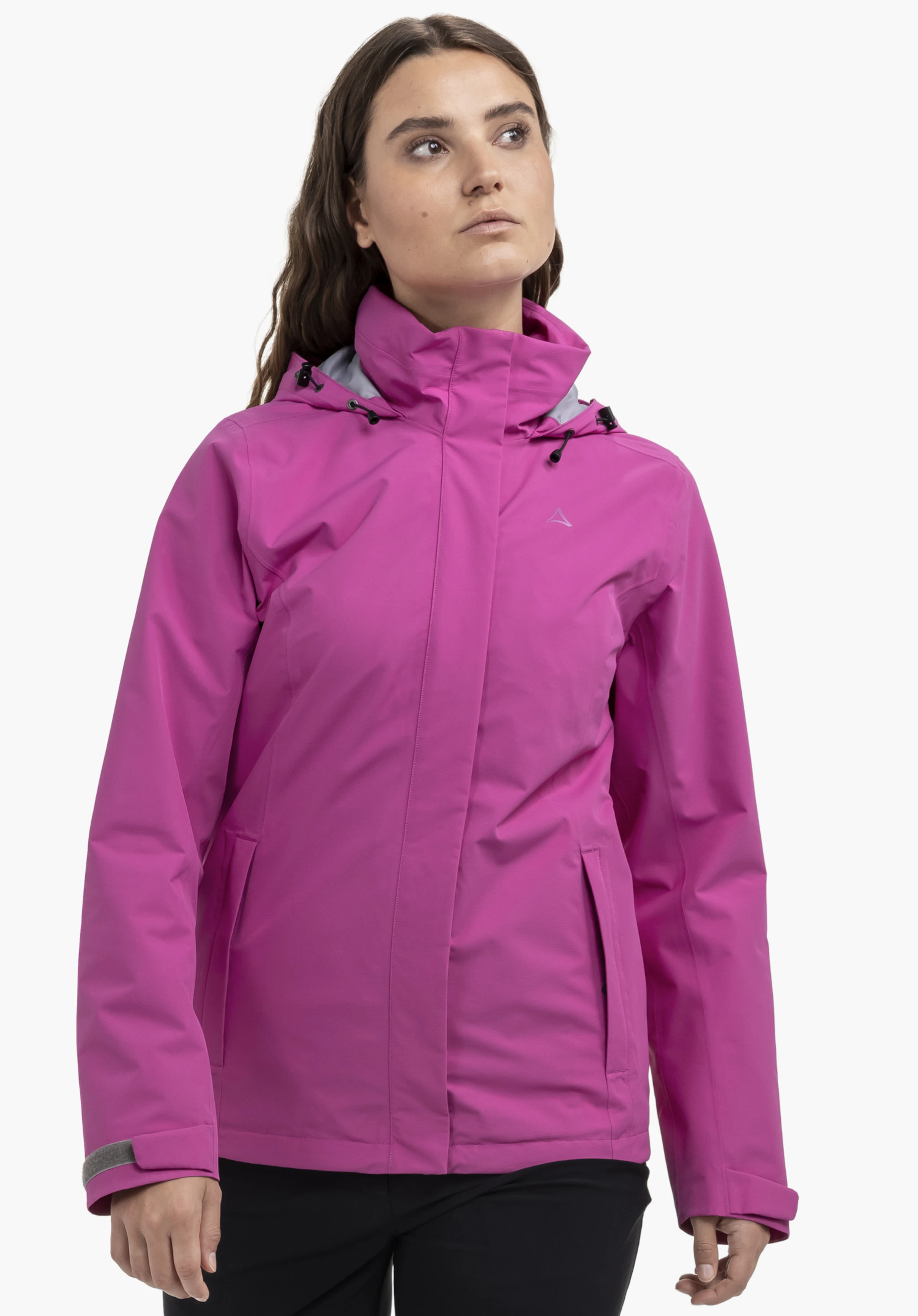 Jacket Gmund L in the colour pink, worn by a female model. The model stands facing forwards and looks slightly to the side. The Schöffel-Logo is visible on the left chest, photographed against a neutral background.