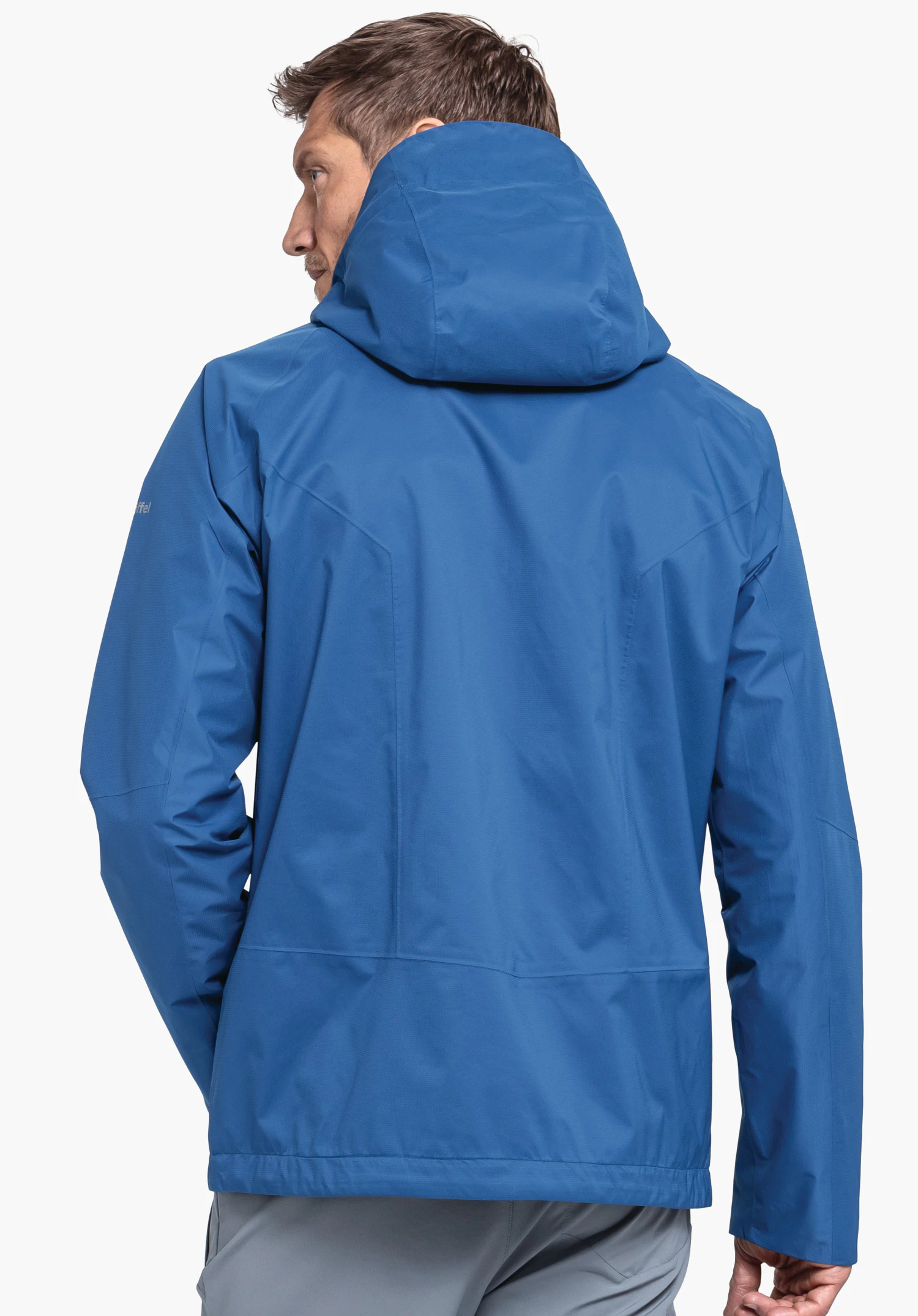 Jacket Easy XT M in blue shown in a rear view with the hood up against a neutral background, Schöffel logo visible on the sleeve.
