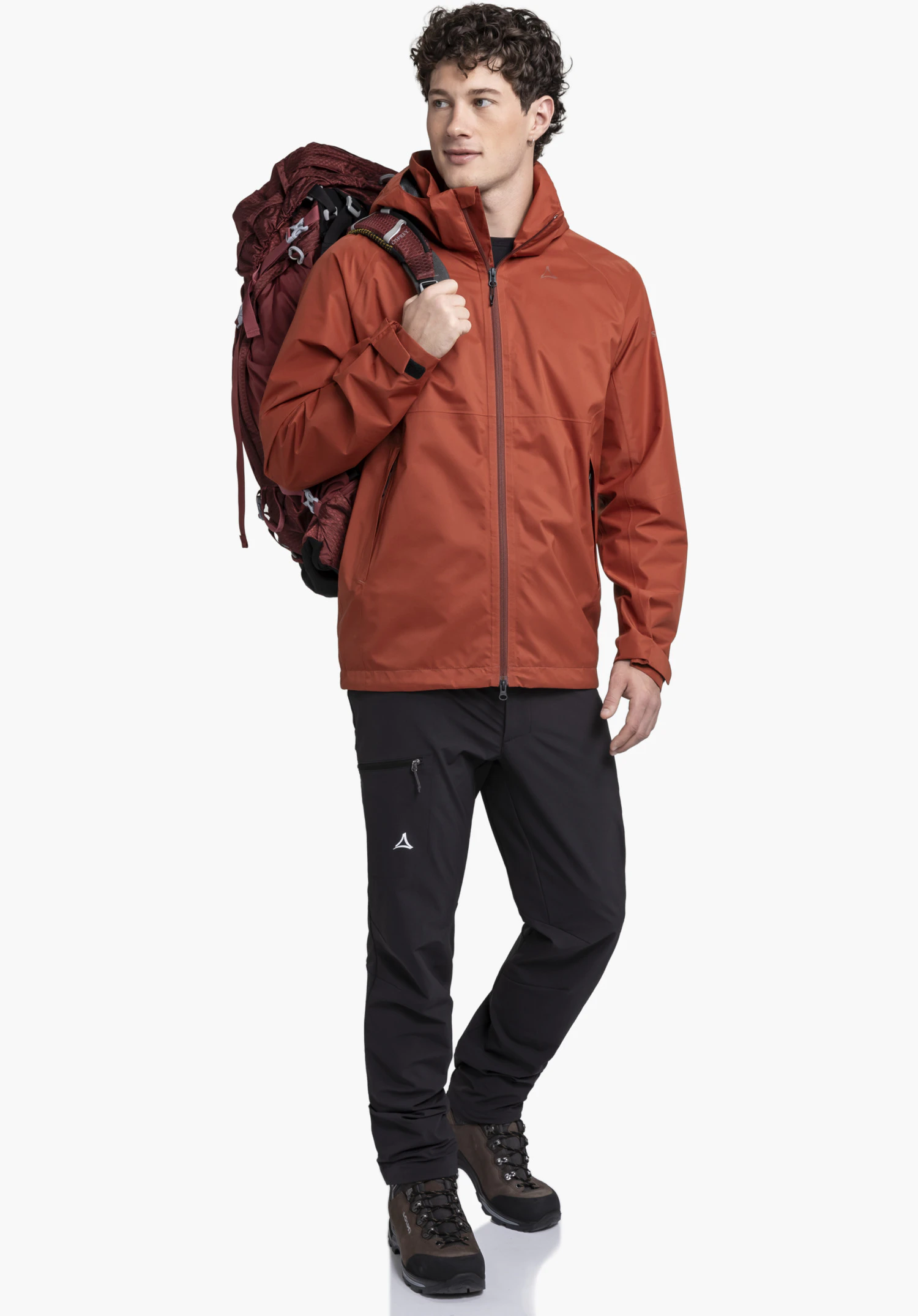 Jacket Easy XT M shows the closed front zip and the Schöffel logo on the red fabric, as a close-up against a white/neutral background.