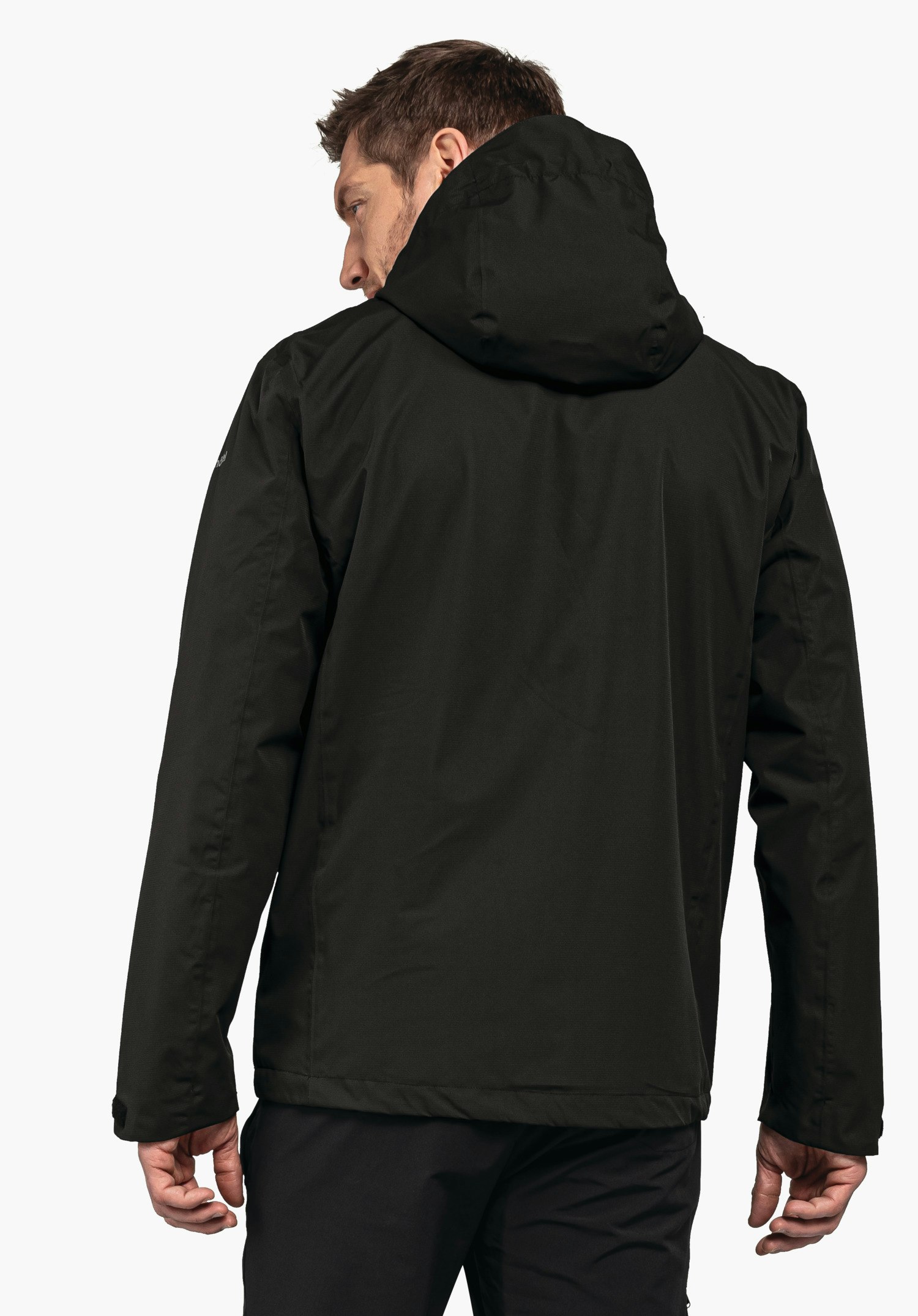 Jacket Gmund M black hooded jacket worn by a man showing his back and looking over his left shoulder; neutral white studio background.