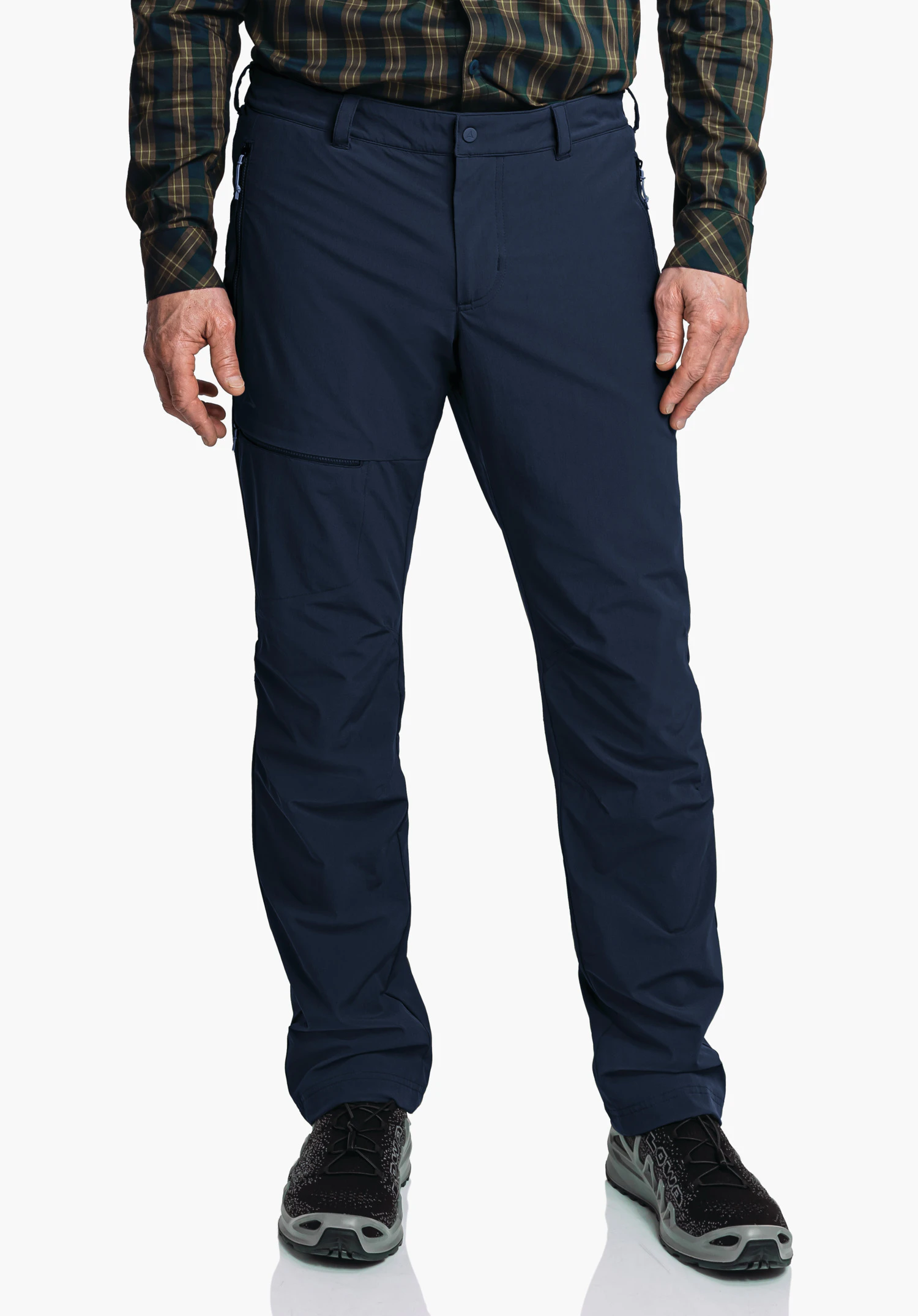 Pants Koper1 Warm M Dark blue outdoor trousers worn standing; person wears a dark green checked shirt and black hiking shoes; hands visible, neutral white background.