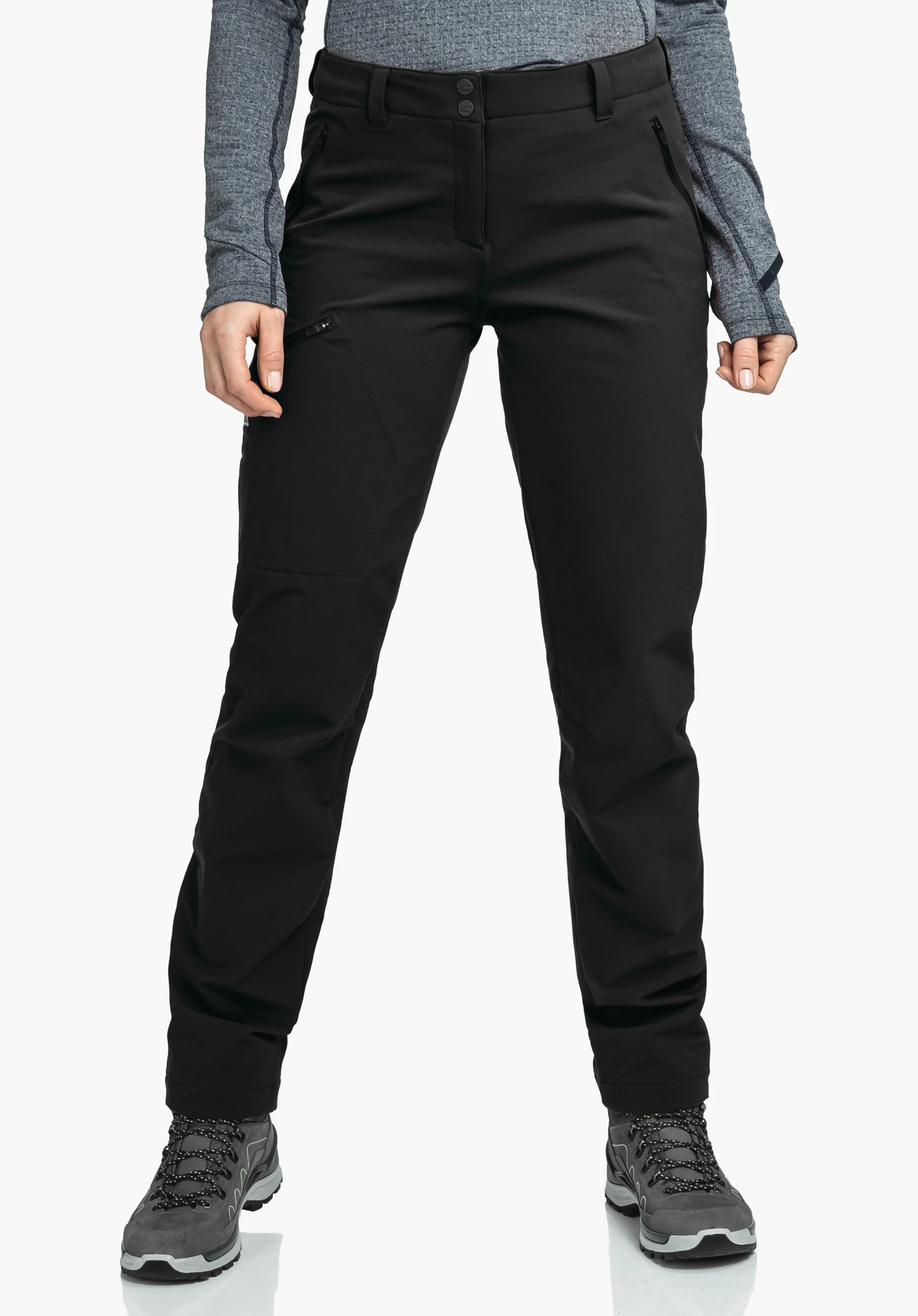 Pants Ascona Warm L black outdoor trousers, worn by a standing person with legs slightly apart; hands at sides, zip pocket on the thigh, hiking shoes, white background.