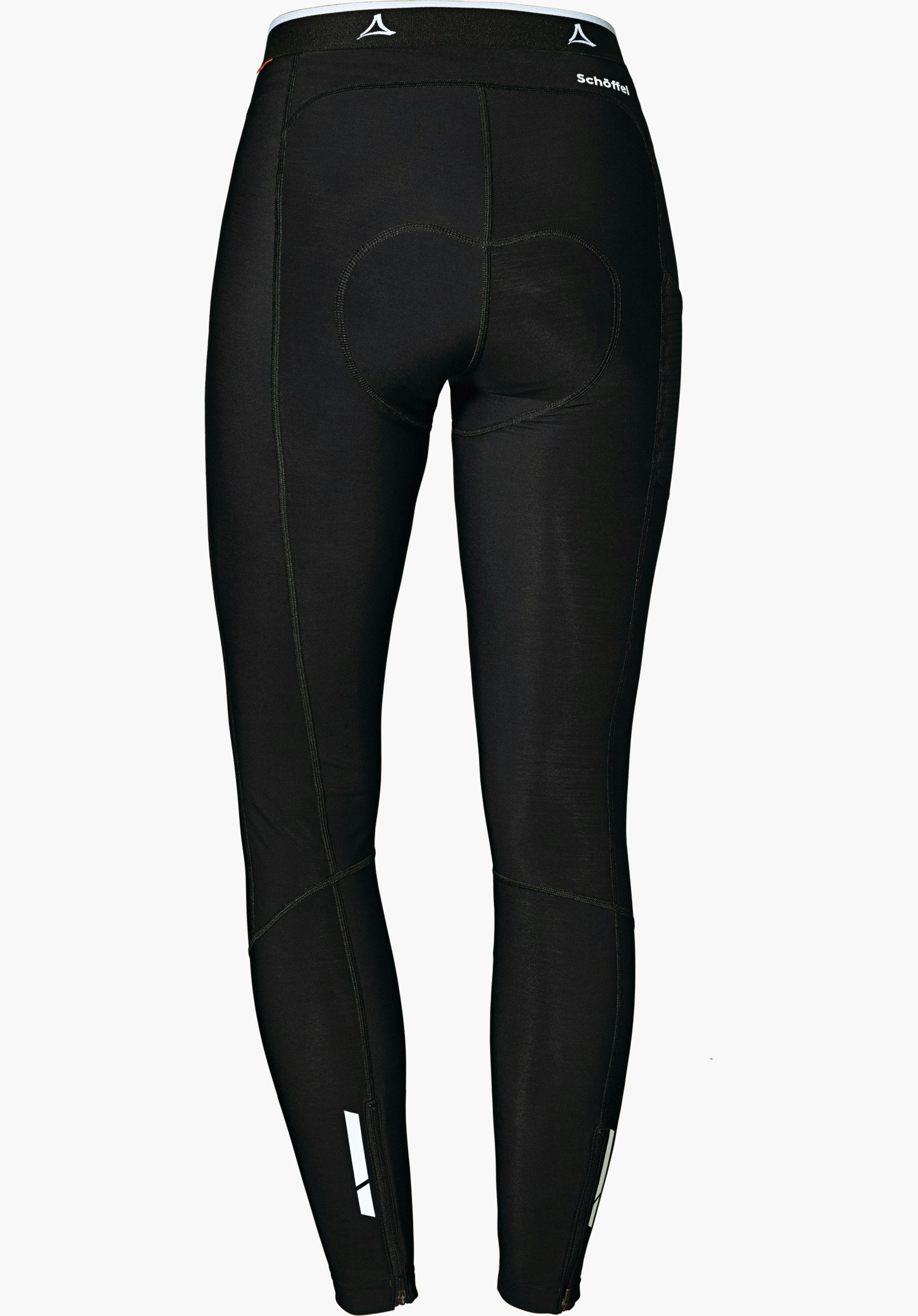 Skin Pants Warm 4h L Cuissard cyclisme noir, présenté de dos, suspendu à plat sur fond clair; assise rembourrée visible, logo Schöffel à la taille, bandes réfléchissantes aux chevilles. Texte : Schöffel.