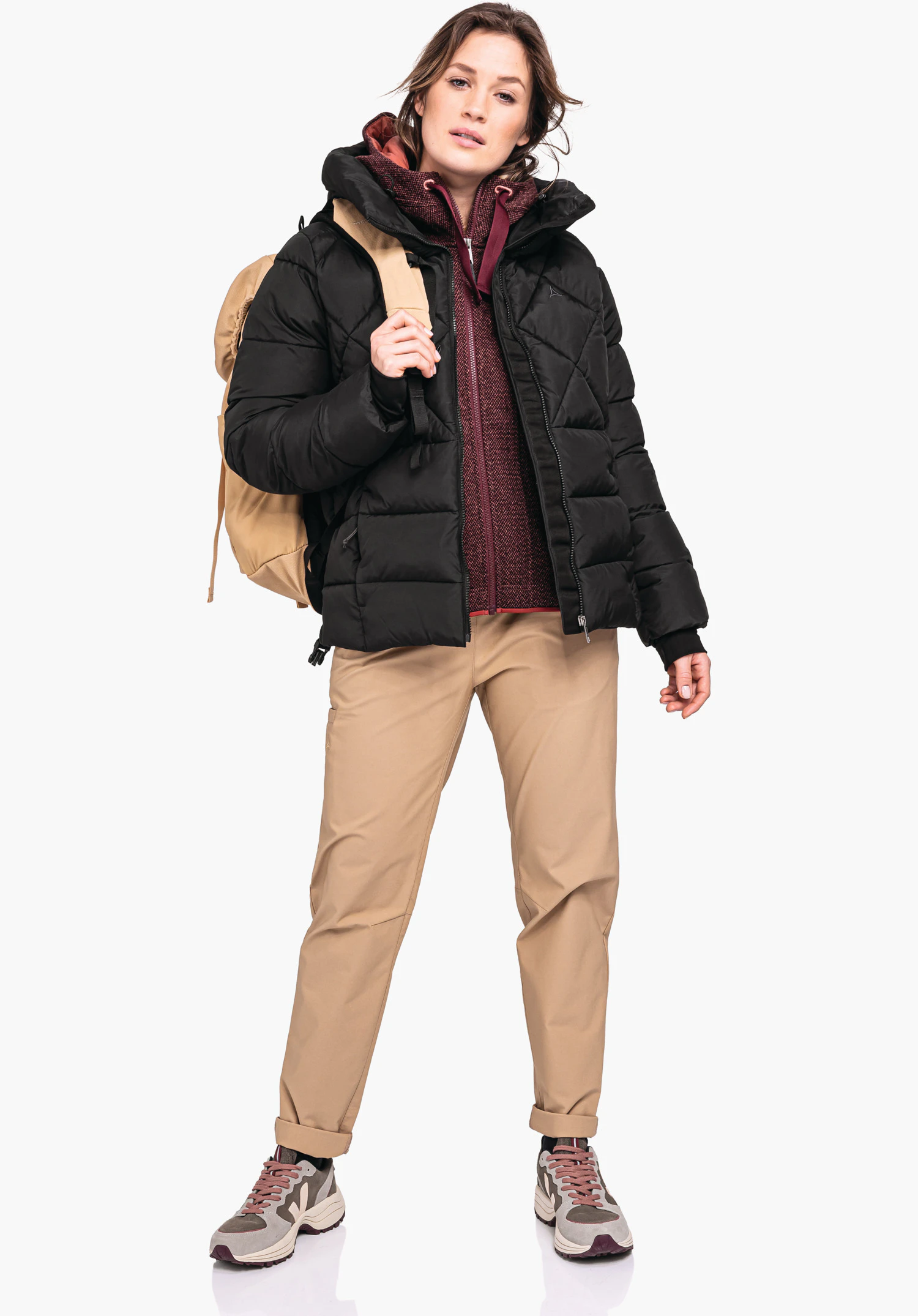 Ins Jacket Boston L features the Schöffel logo on the left chest, embedded in the stylish quilting of the black fabric, as a close-up against a white background.