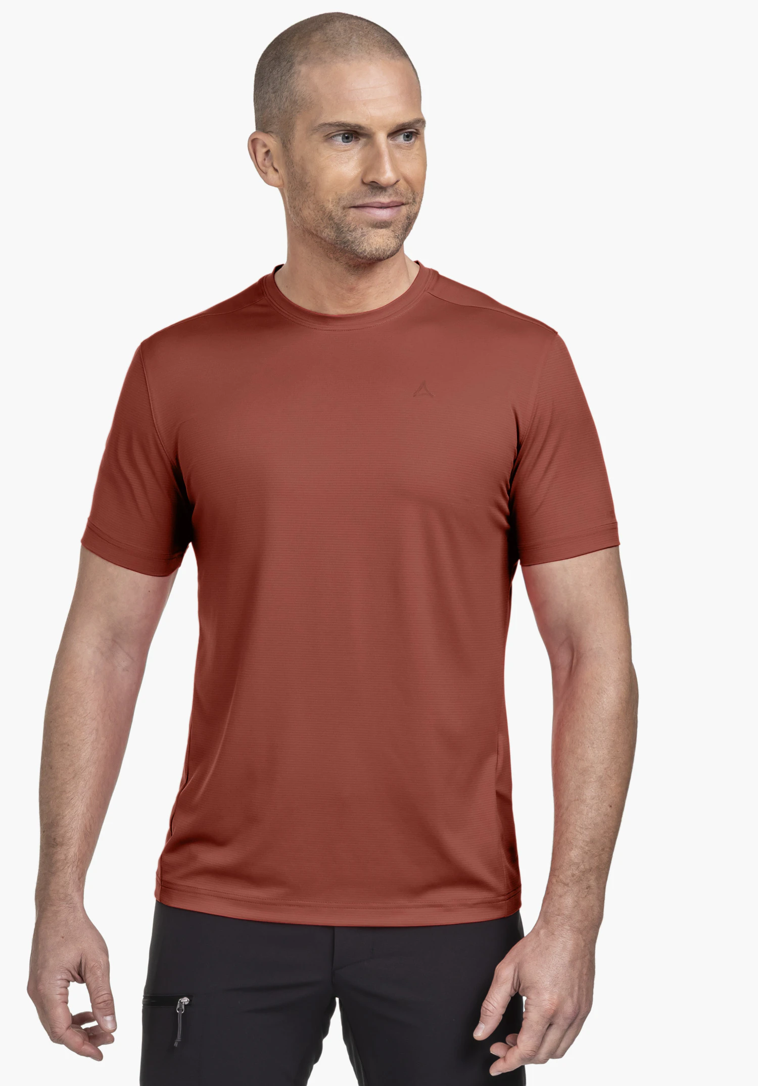 CIRC T Shirt Tauron M in a vibrant red, showcased on a model in a front view against a neutral background. The subtle Schöffel logo is visible on the chest, highlighting the clean, sporty aesthetic.