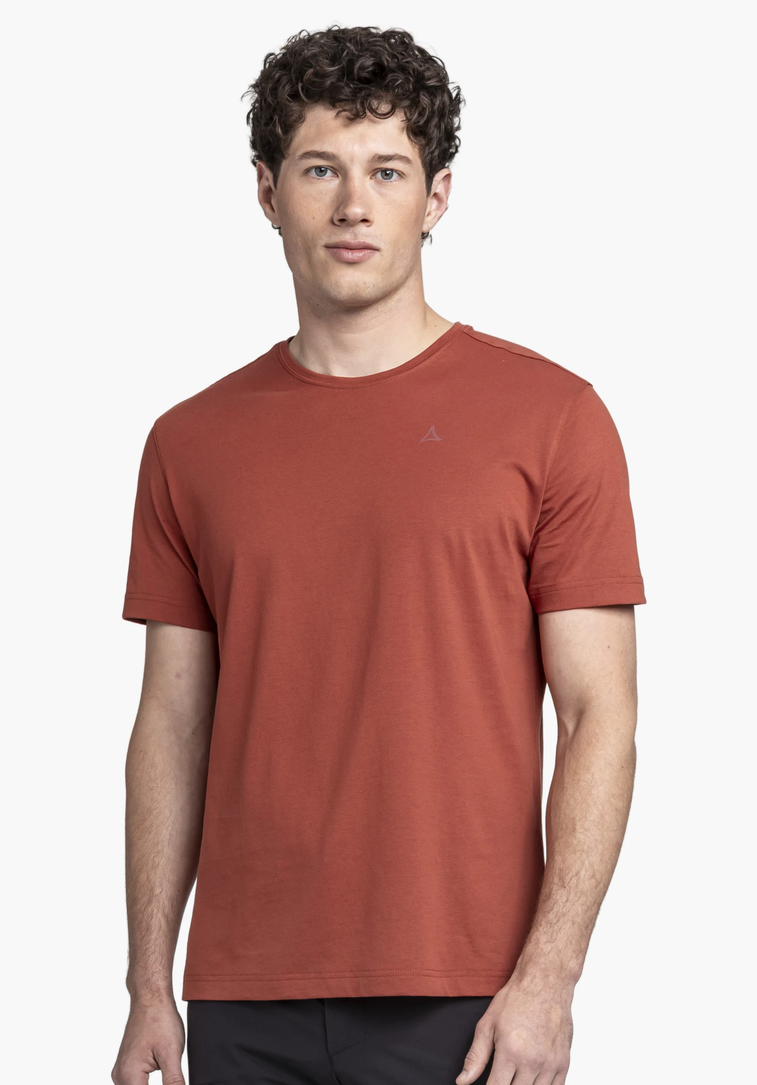 T Shirt Hohberg M in vibrant red is showcased by a model standing front-on against a neutral background. The subtle Schöffel logo is visible on the chest.