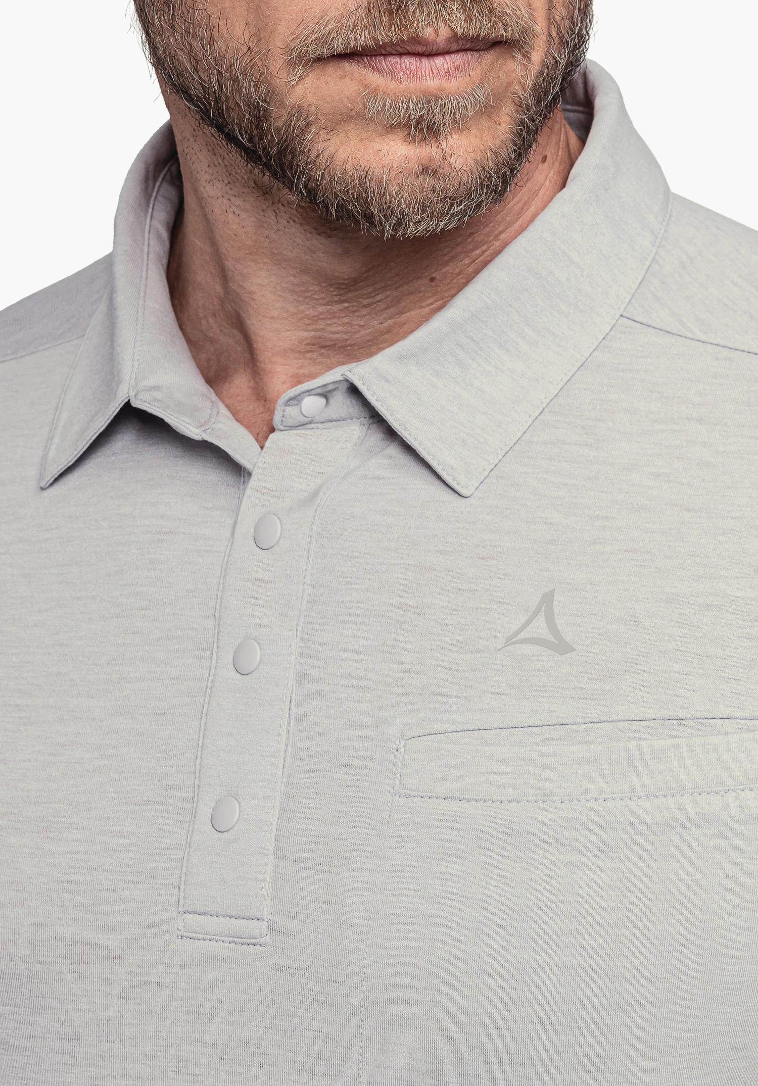 Polo Shirt Ramseck M shows the grey chest detail with a button placket, a subtle chest pocket and the Schöffel-Logo on the marl fabric. Close-up against a white/neutral background.