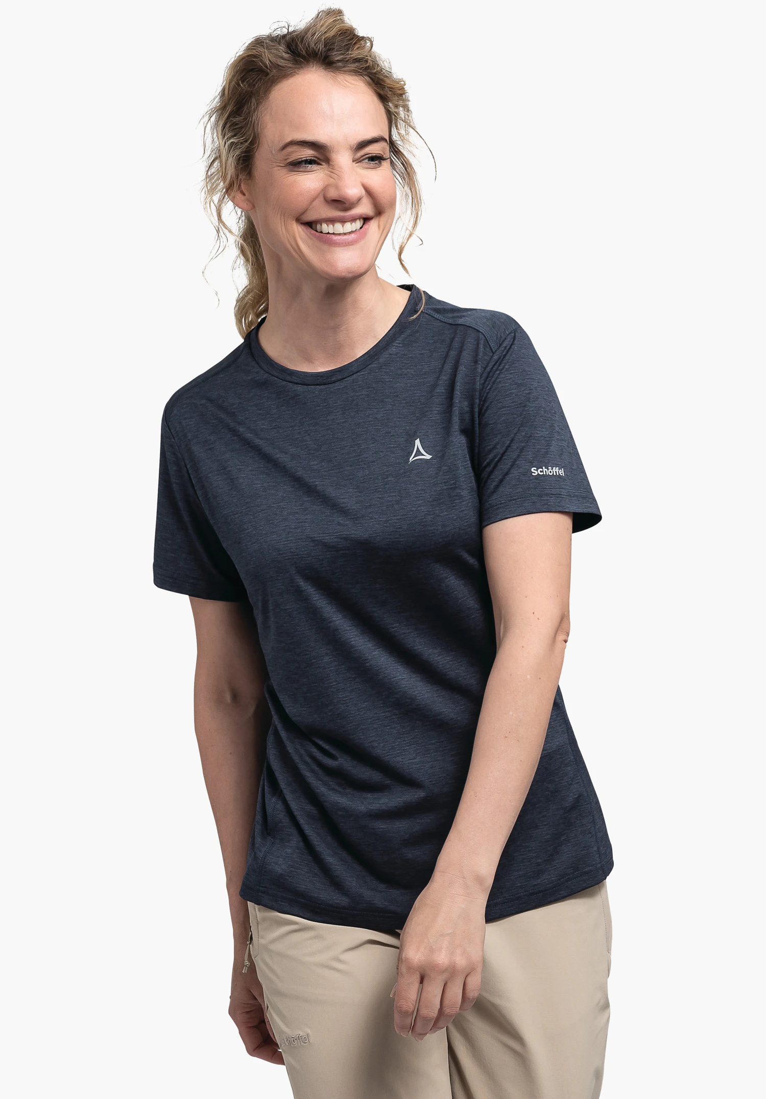 CIRC T Shirt Tauron L dark blue T-shirt with Schöffel logo, worn by a smiling woman against a white background. Text on sleeve: Schöffel.