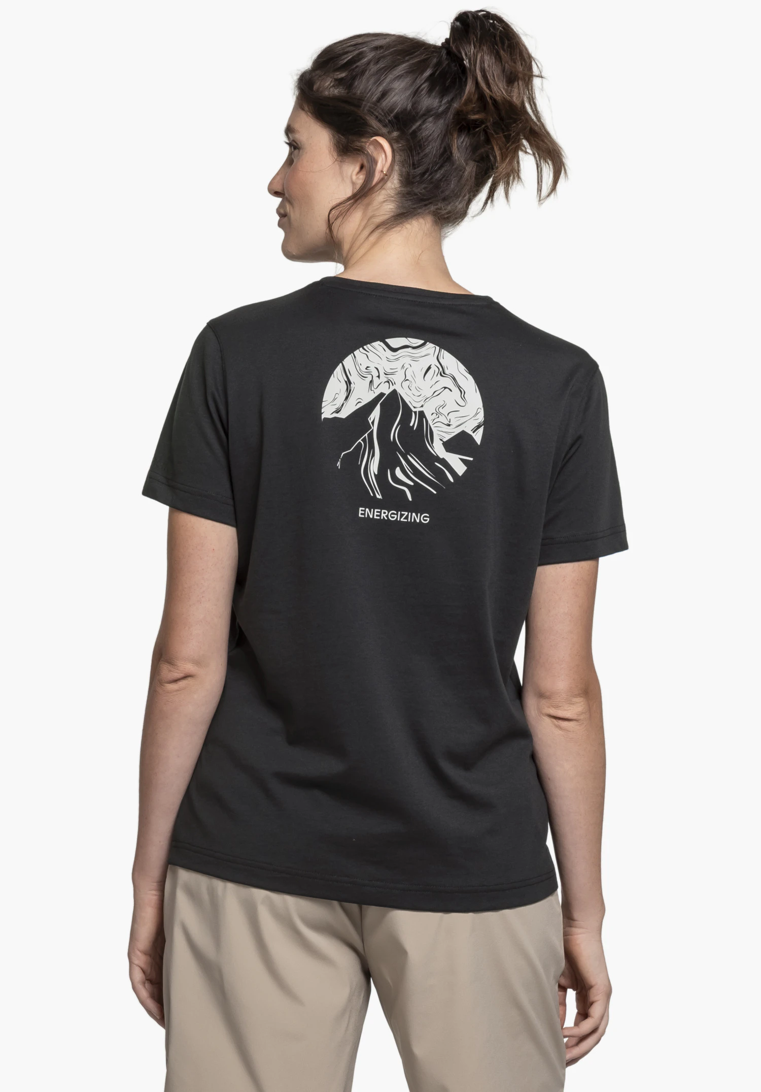 T Shirt Buchberg L in black. The model is shown from behind against a neutral background. The shirt displays the striking back print and the subtle Schöffel logo.