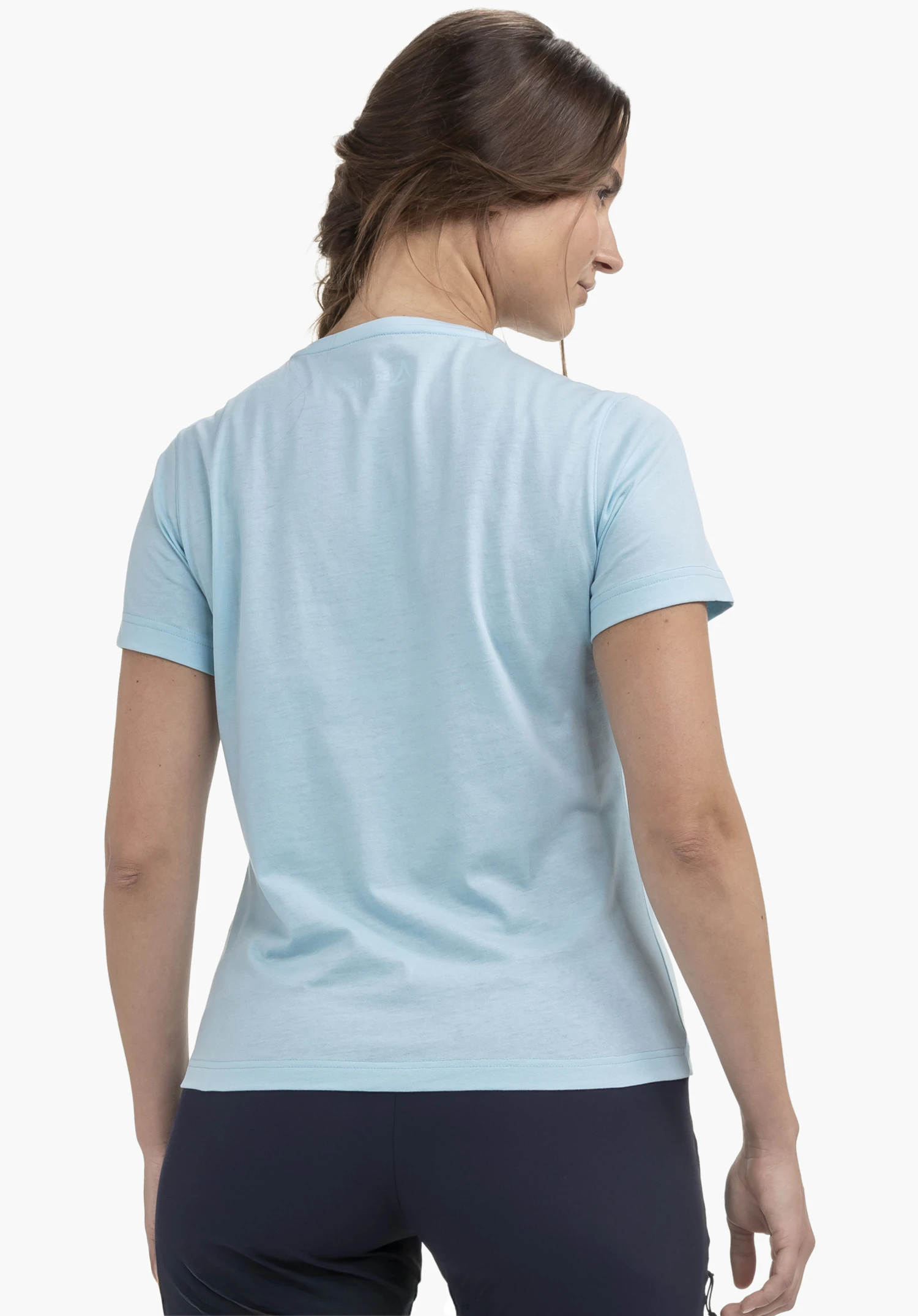 T Shirt Hohberg L in a back view worn by a model against a neutral background, with the Schöffel logo visible on the neck of the blue garment.