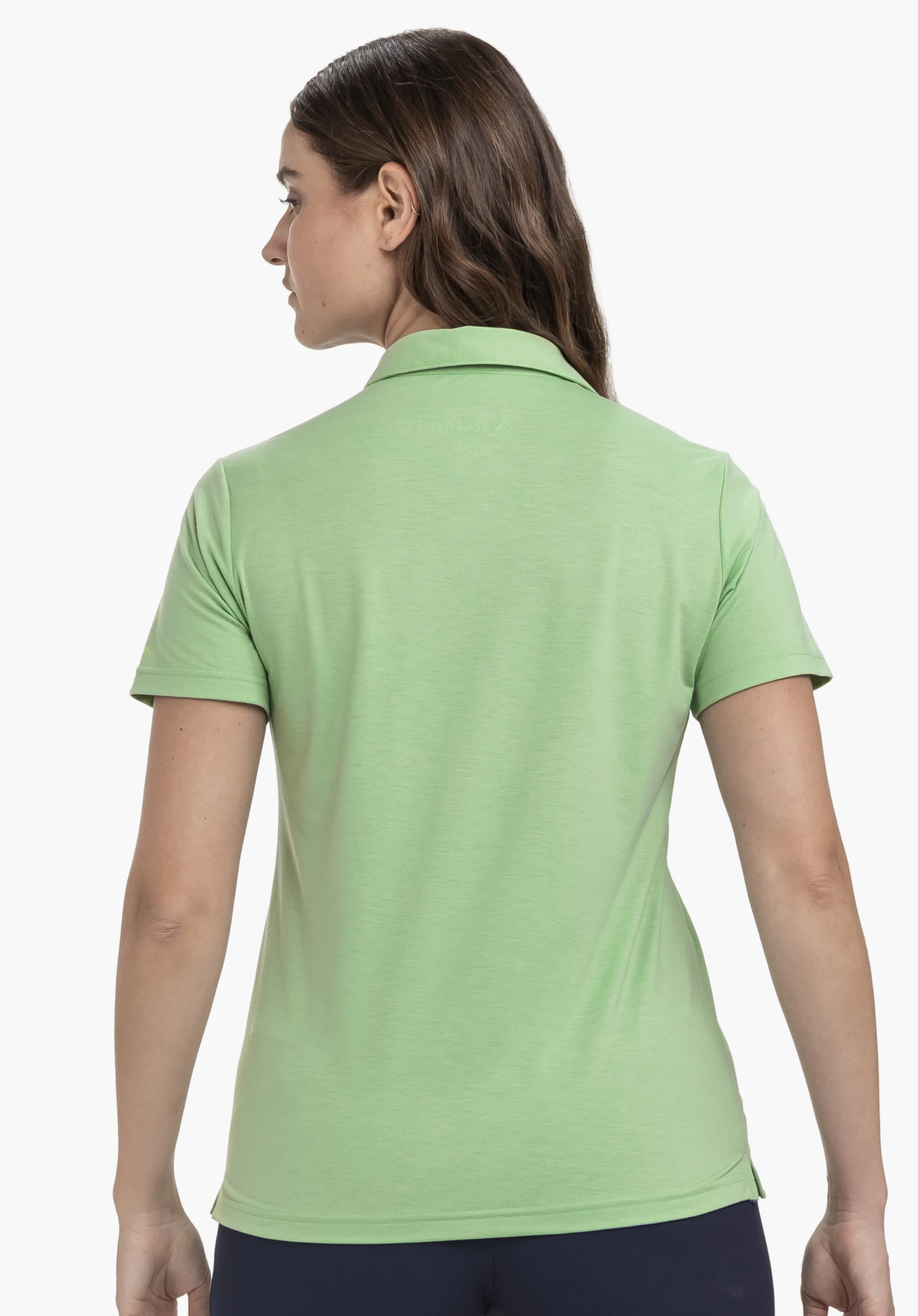 Polo Shirt Ramseck L in green, shown from the back against a neutral background. The model wears the shirt, highlighting the subtle Schöffel logo positioned in the neck area.