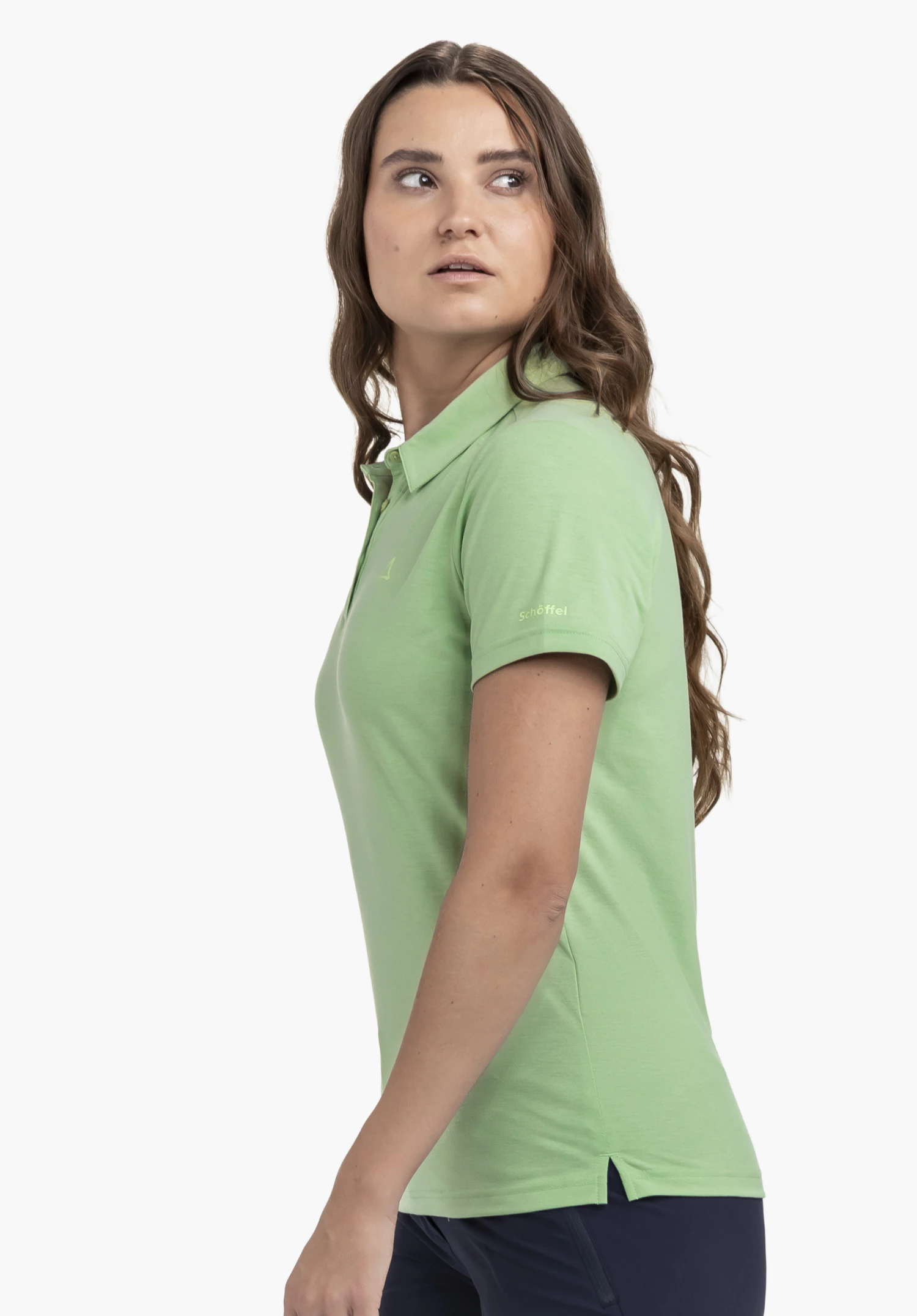 Polo Shirt Ramseck L, the fine green fabric on the sleeve featuring the Schöffel logo, close-up against a white background.