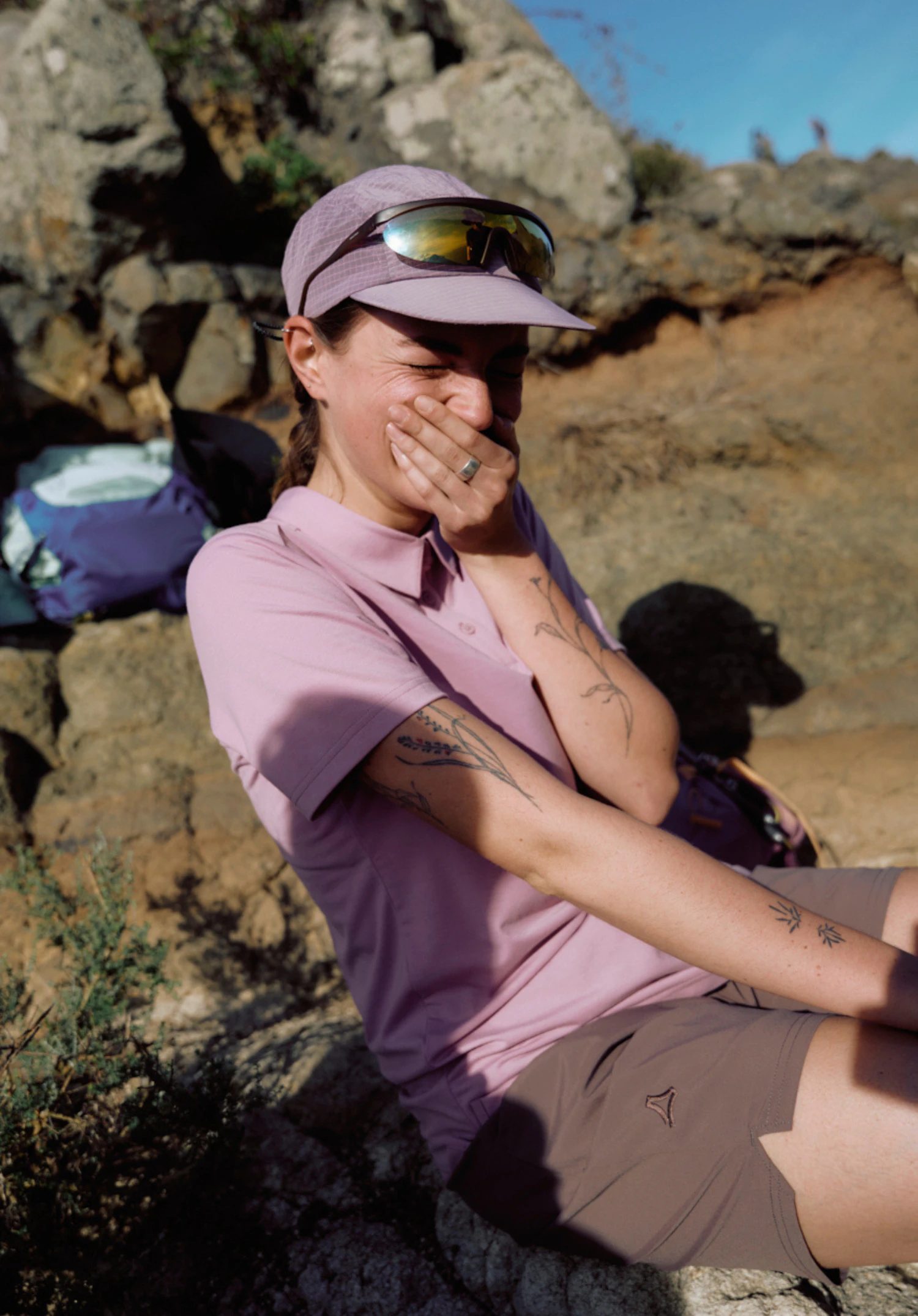 Polo Shirt Ramseck L worn by a model standing frontally and looking at the camera. The pink shirt features a classic collar with a button placket and the Schöffel logo on the left chest, presented against a neutral background.