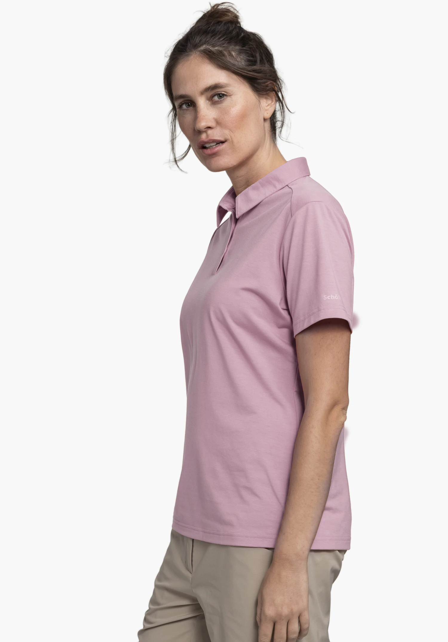 Polo Shirt Ramseck L, focus on the sleeve area featuring the subtle Schöffel-Logo on the soft pink fabric, close-up against a white background.