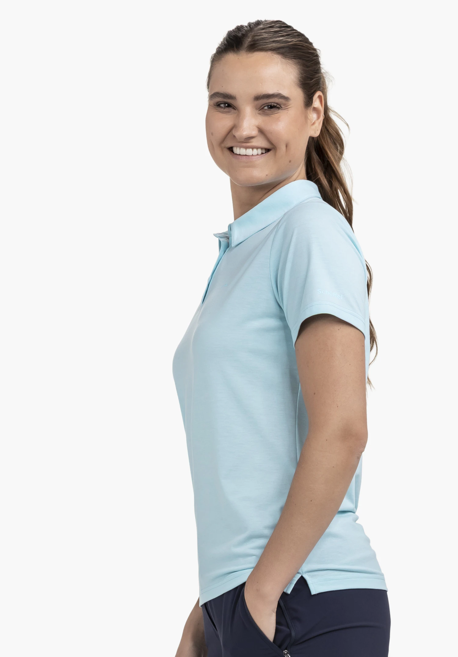 Polo Shirt Ramseck L, focus sur le logo Schöffel discret sur la manche bleue, gros plan sur fond blanc/neutre.