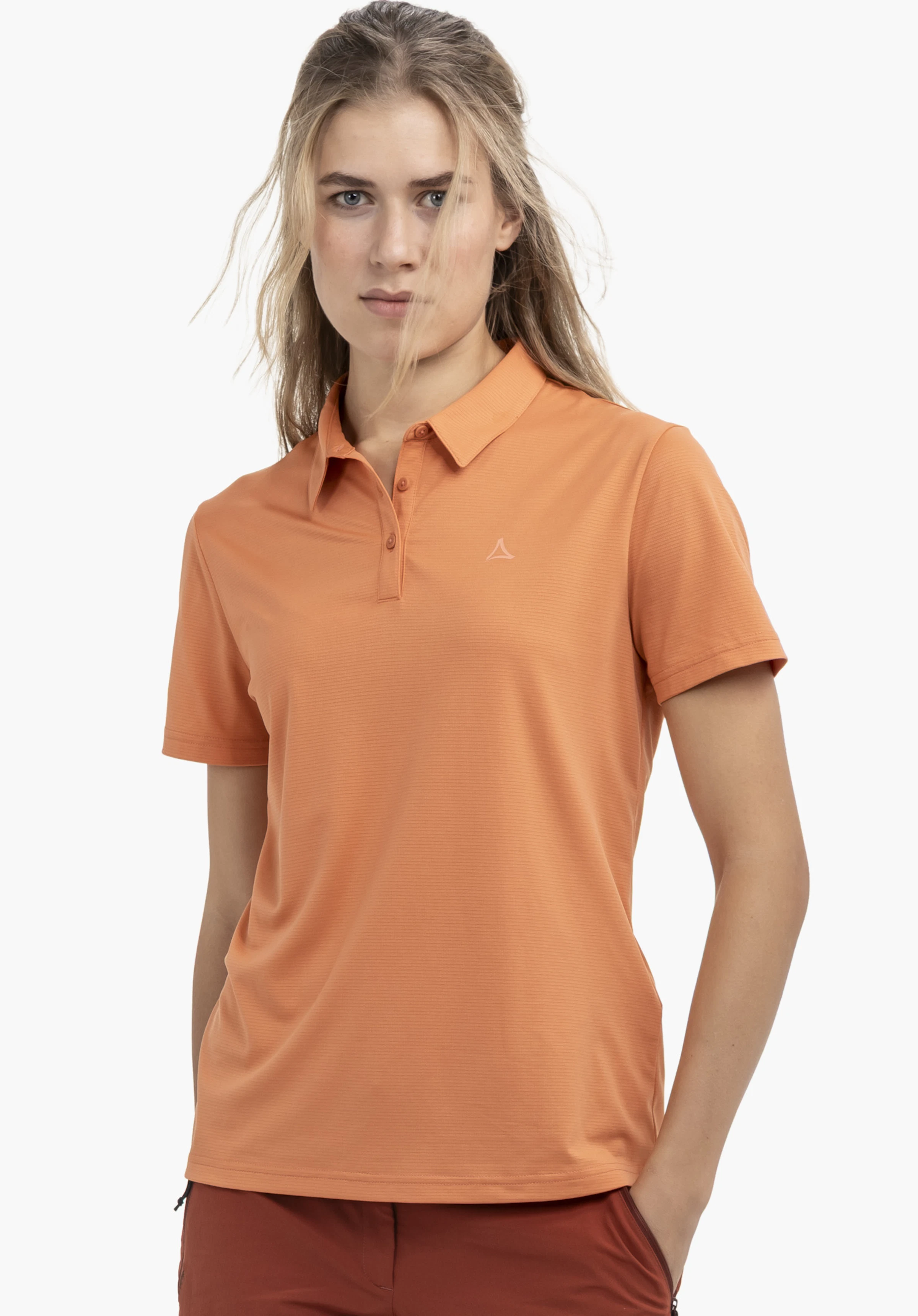 CIRC Polo Shirt Tauron L en orange, présenté par un mannequin. Le mannequin se tient de face devant un fond neutre, avec le logo Schöffel discrètement visible sur la poitrine gauche.