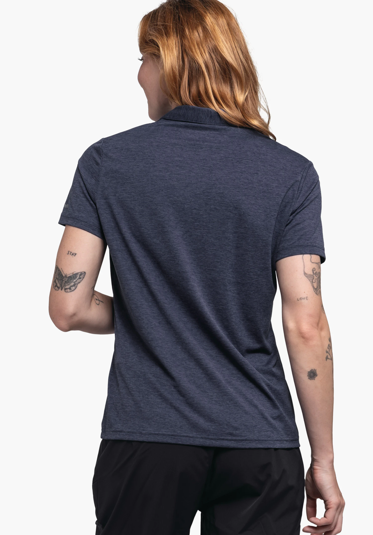 CIRC Polo Shirt Tauron L en bleu. Le modèle est présenté de dos sur un fond neutre, mettant en valeur le logo Schöffel discret sur la manche.