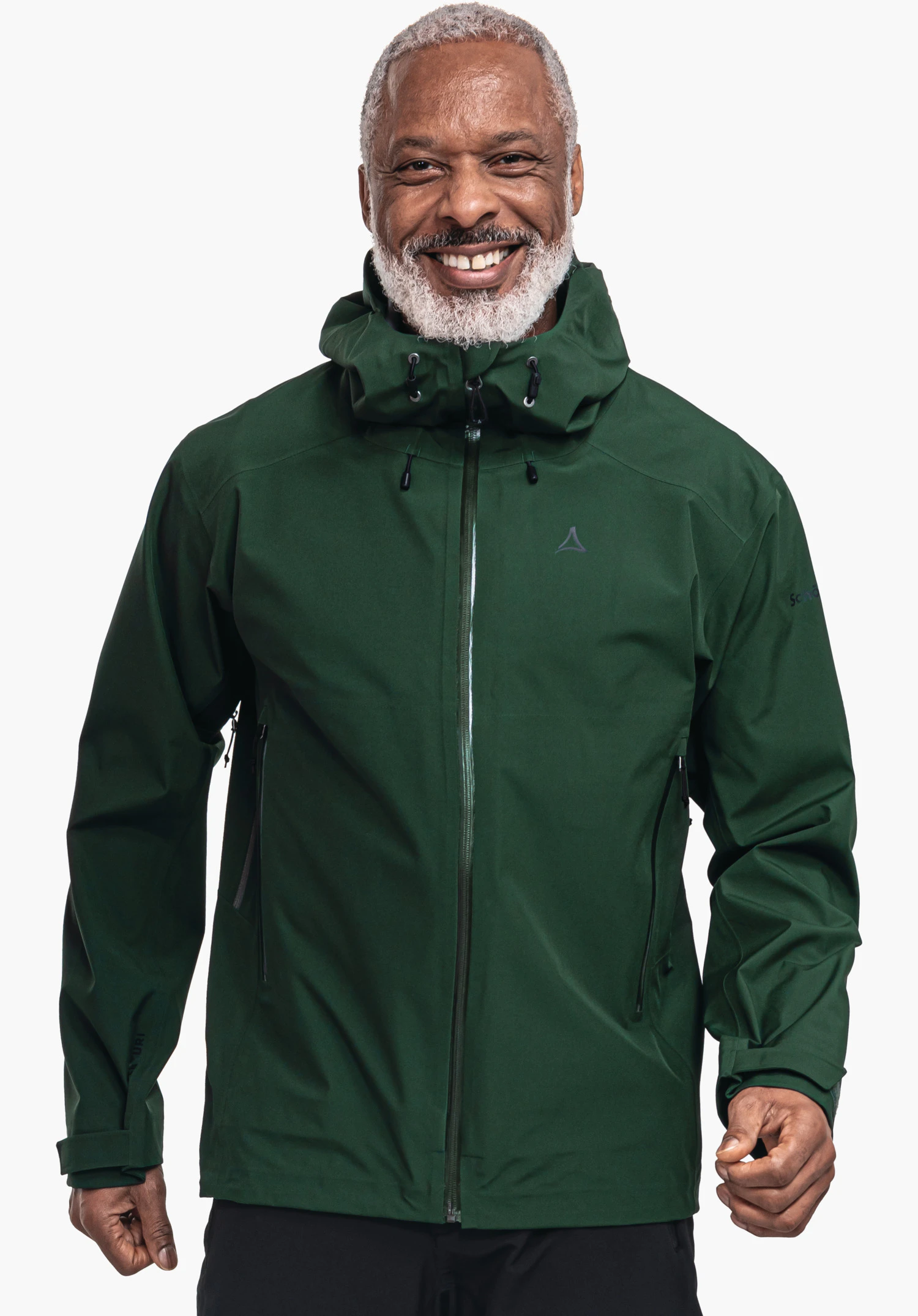 Jacket Gmund M donkergroene jas gedragen door een lachende man met witte baard; Schöffel-logo op de borst; capuchon aangesnoerd; staande opname voor een effen witte achtergrond.