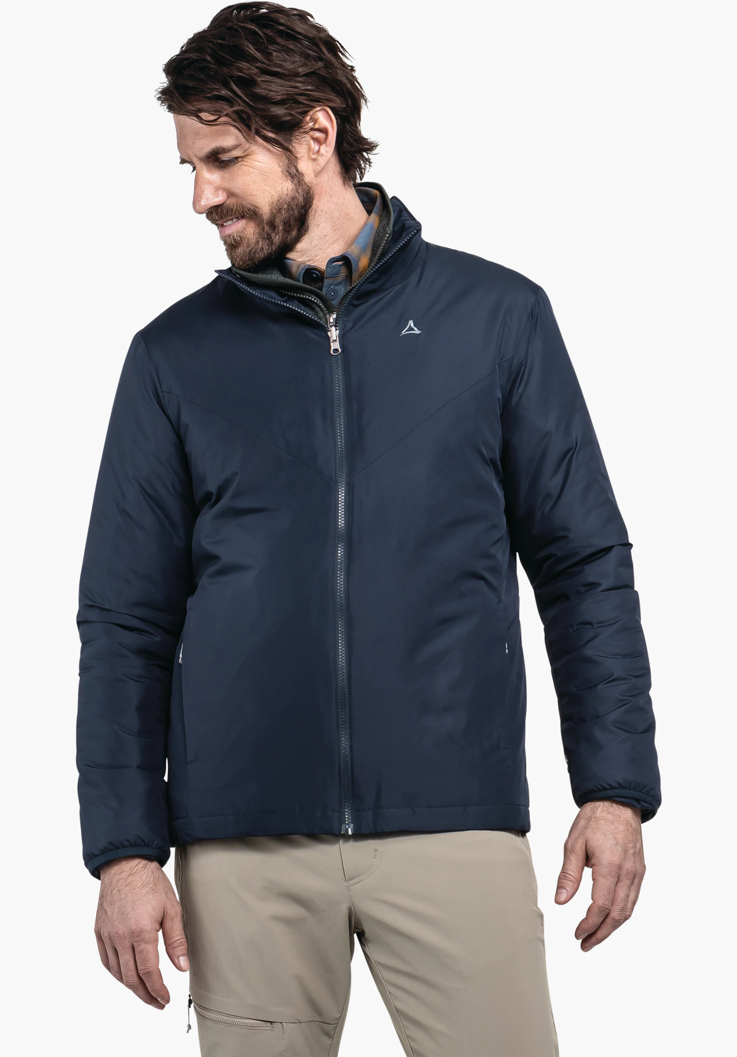 3in1 Jacket Style Tamina MNS dark blue jacket, worn by a man looking to the left and smiling slightly; Schöffel logo on the chest; standing half-portrait against a white background.