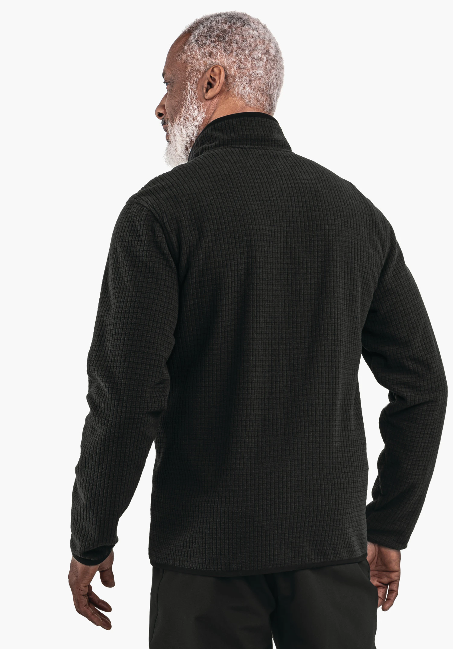 CIRC Fleece Jk Style Terxa MNS black ribbed long-sleeve jumper worn by a man with white hair and beard; standing with his back to the viewer; light neutral background.