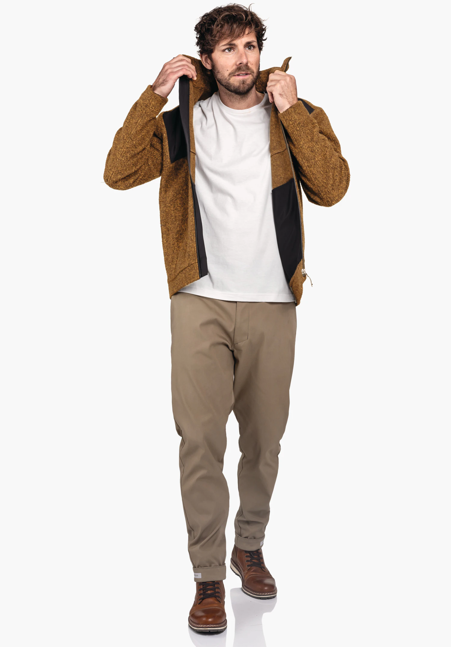 Fleece Jk Style Canterbury MNS, showing the textured surface of the brown fleece fabric as well as the front zip, close-up against a white background., Fleece Jk Style Canterbury MNS, showing the textured surface of the brown fleece fabric as well as the front zip, close-up against a white background.