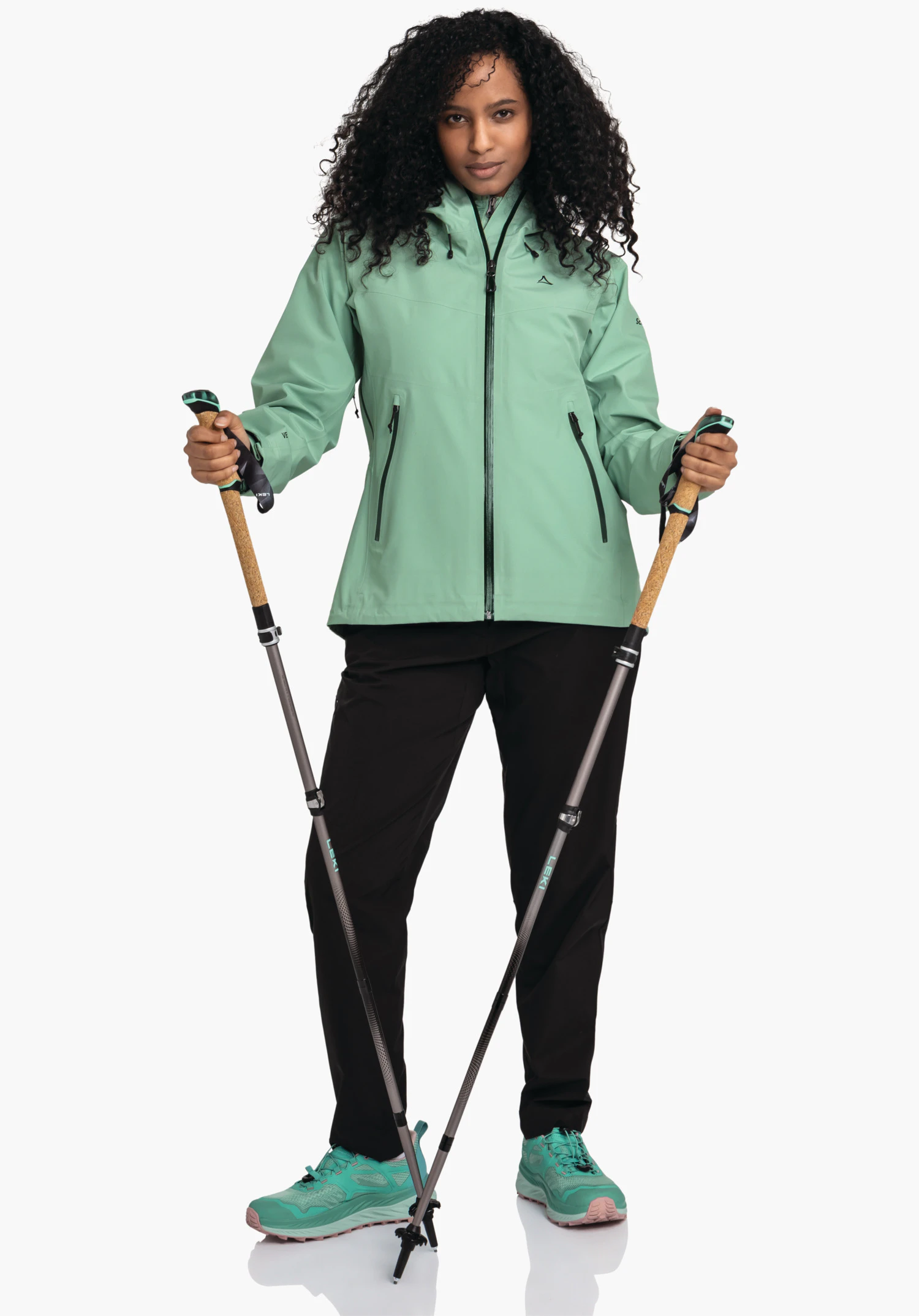 Jacket Style Cascata WMS features the green technical fabric on the chest, the Schöffel logo and the front zip. Close-up against a white/neutral background.