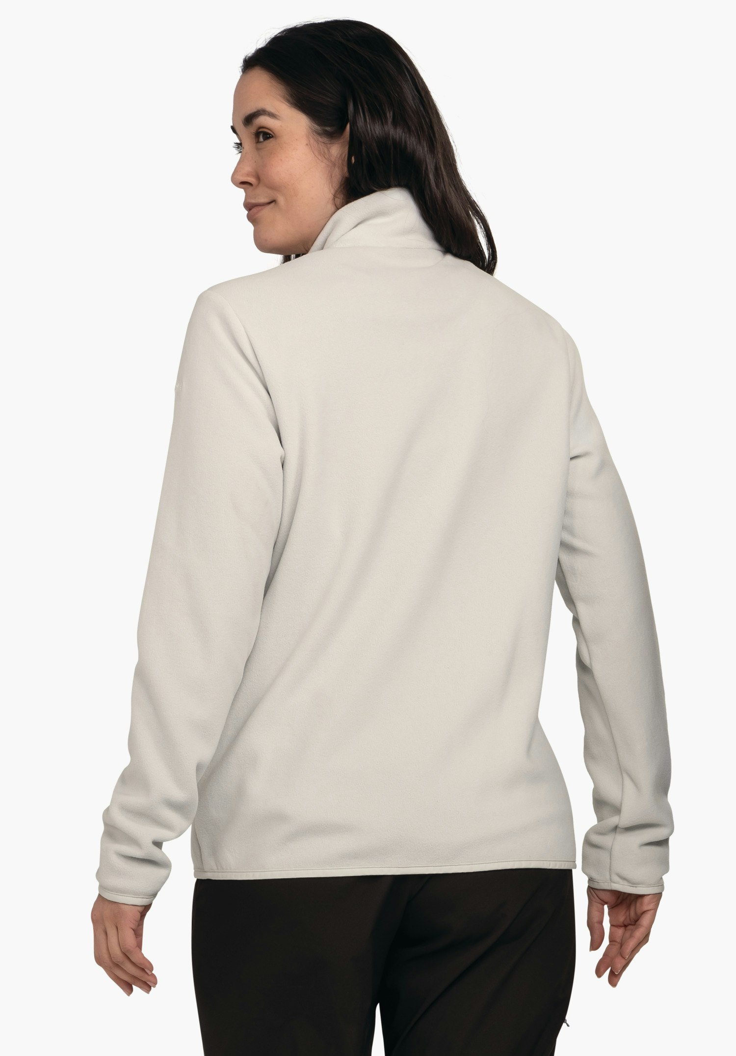 Fleece Jk Style Ash WMS hellgraue Fleecejacke, Rückansicht. Person trägt Jacke, steht leicht gedreht und blickt seitlich; dunkelbraunes Haar, schwarze Hose, neutraler weißer Hintergrund.