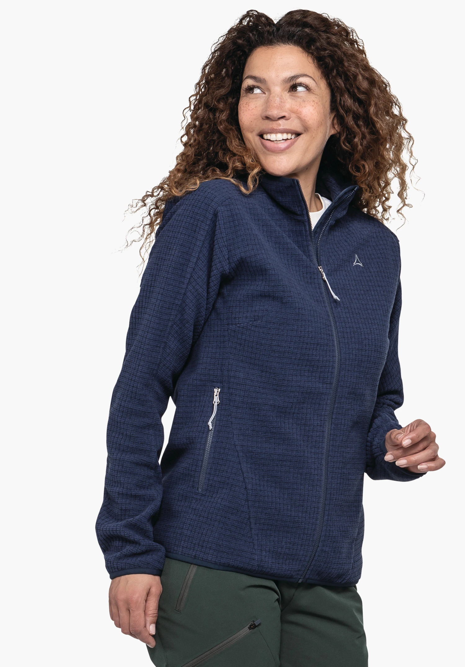 CIRC Fleece Jk Style Terxa WMS dark blue fleece jacket with Schöffel logo, worn by a smiling woman looking sideways; zip pockets visible, dark green trousers; white background.