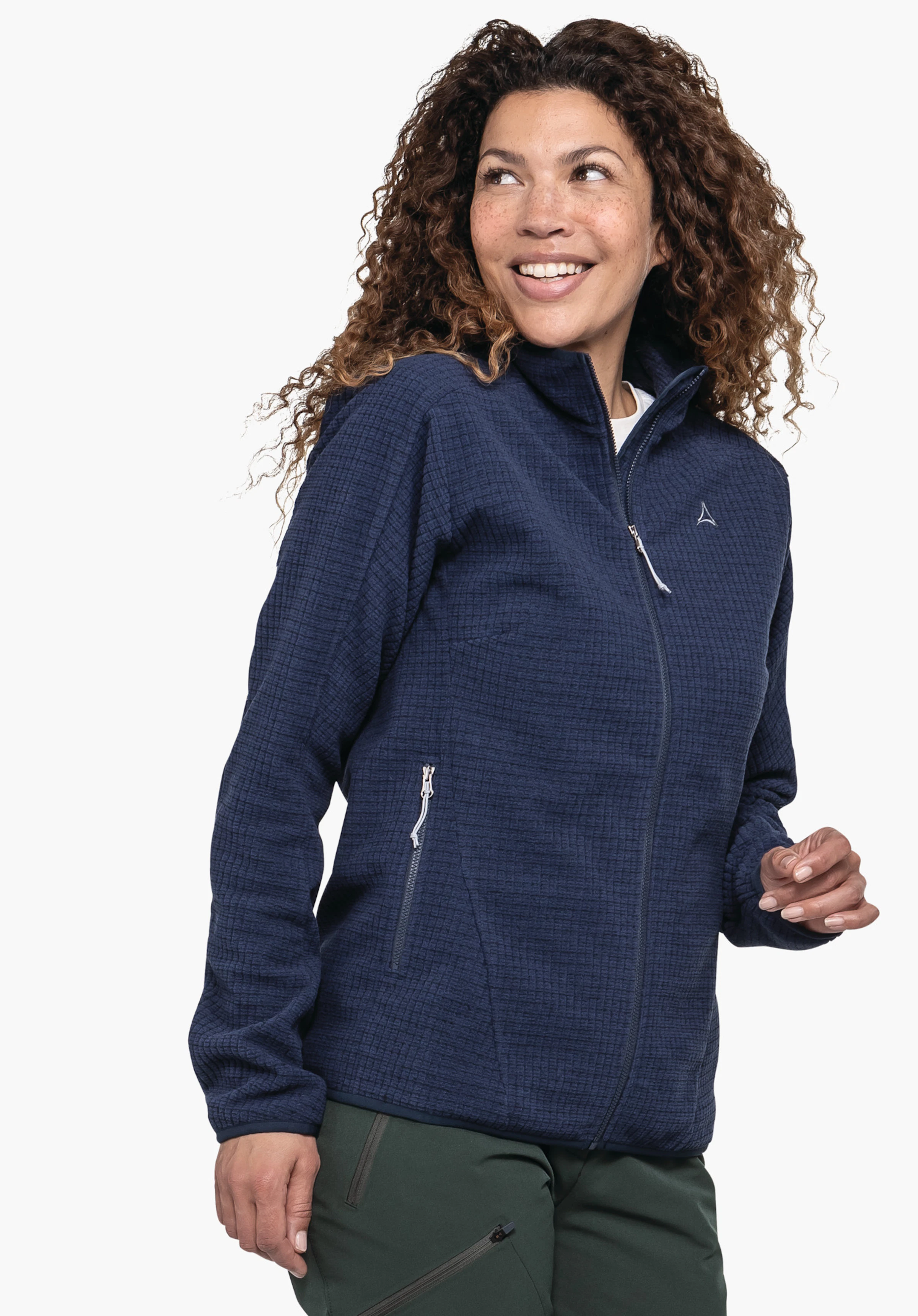CIRC Fleece Jk Style Terxa WMS dark blue fleece jacket with Schöffel logo, worn by a smiling woman looking sideways; zip pockets visible, dark green trousers; white background.