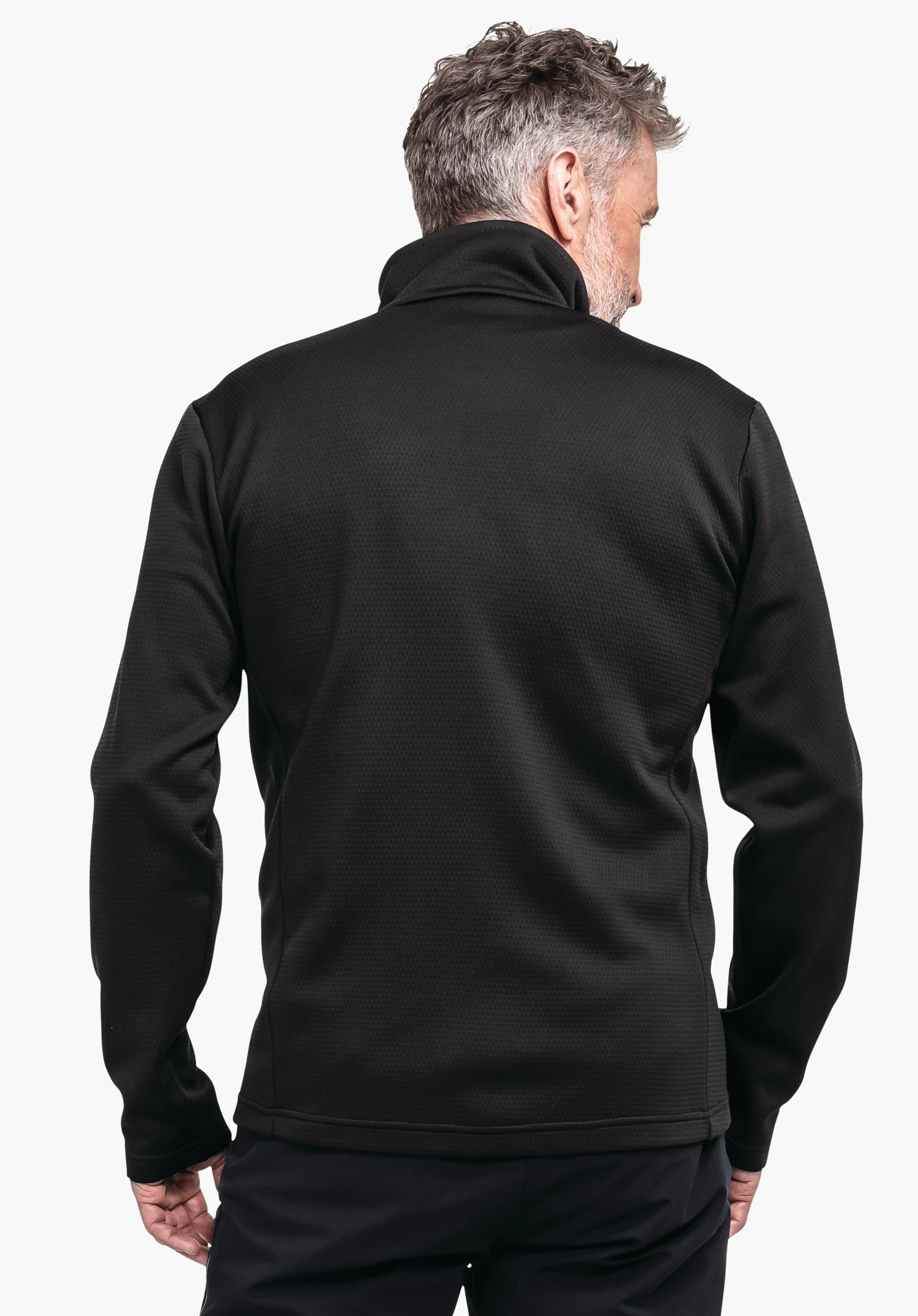 Fleece Jk Style Pine MNS black jacket worn by a man, rear view; stands slightly turned to the right with hands relaxed at the sides; neutral light white background.