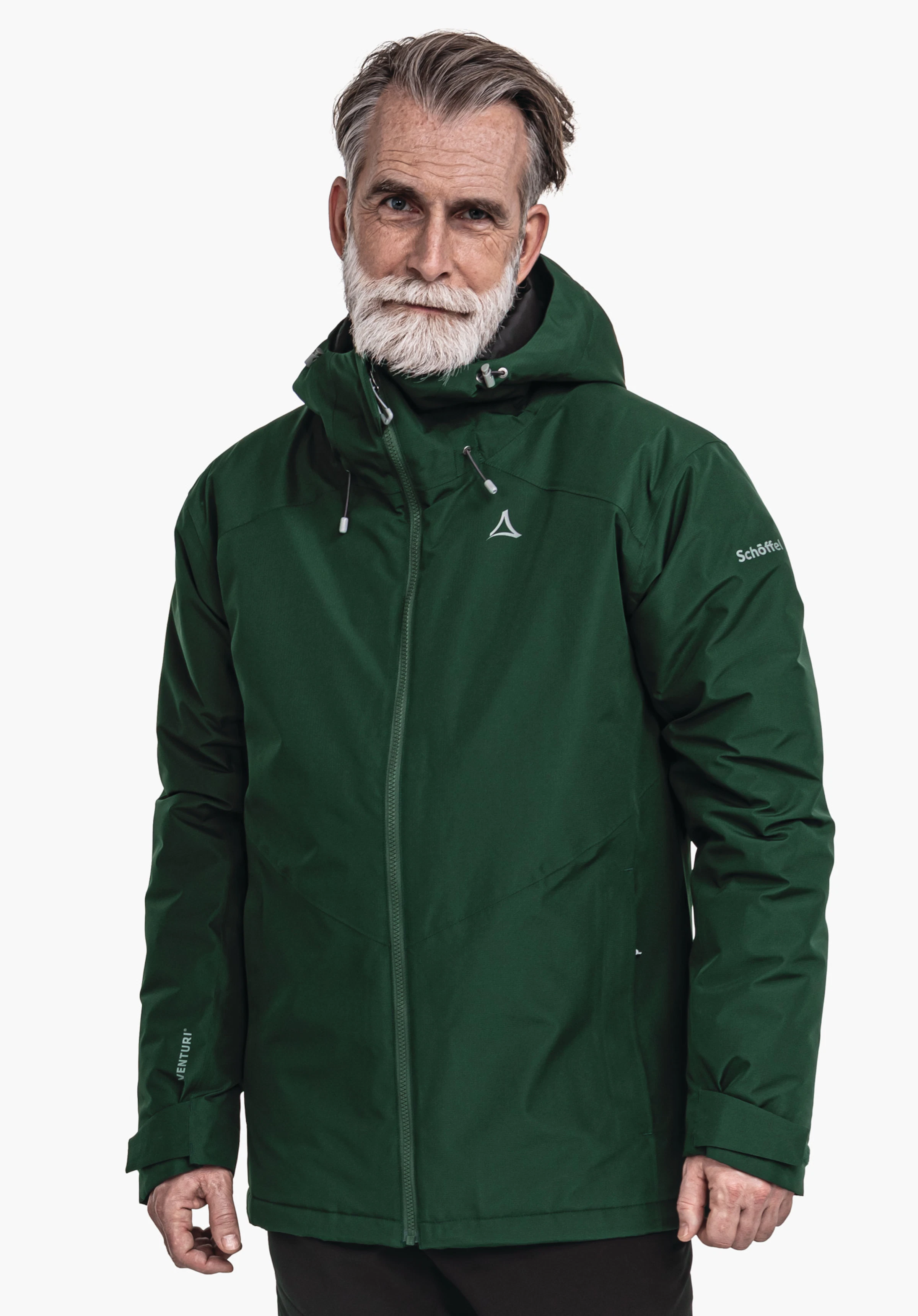 Ins Jacket Style Wildkar MNS Dark green jacket worn by an older man; Schöffel logo on the chest; sleeve print: “Schöffel” and “VENTURI”; man against a white background.