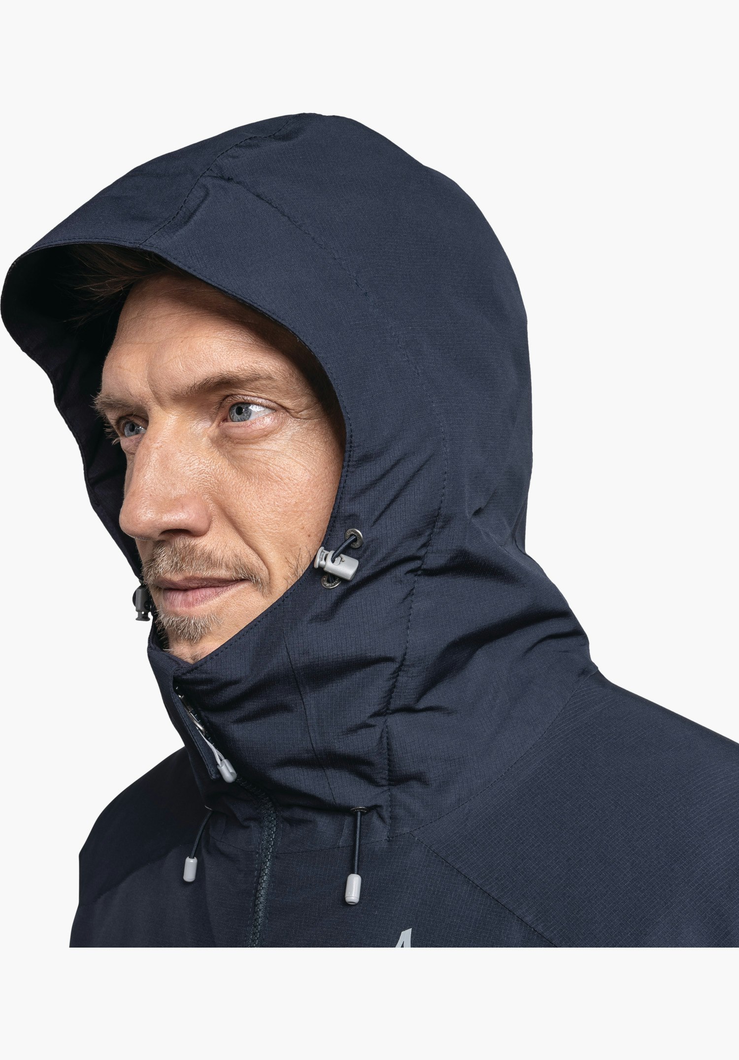 Ins Jacket Style Wildkar MNS zeigt die verstellbare Kapuze mit Kordelzug und den hohen, schützenden Kragen in Blau, Nahaufnahme vor weißem Hintergrund.