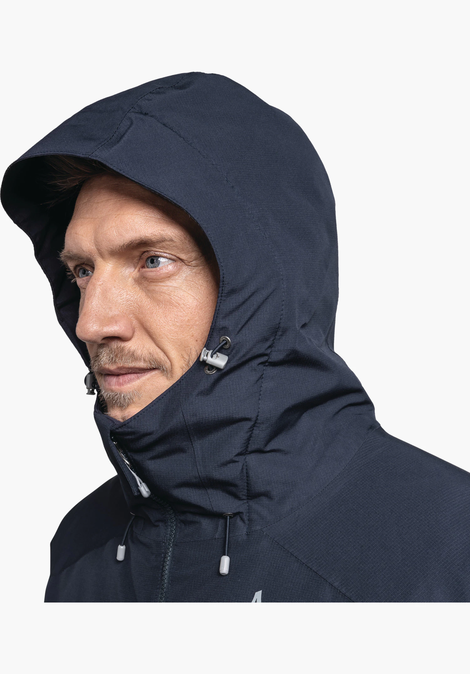Ins Jacket Style Wildkar MNS zeigt die verstellbare Kapuze mit Kordelzug und den hohen, schützenden Kragen in Blau, Nahaufnahme vor weißem Hintergrund.