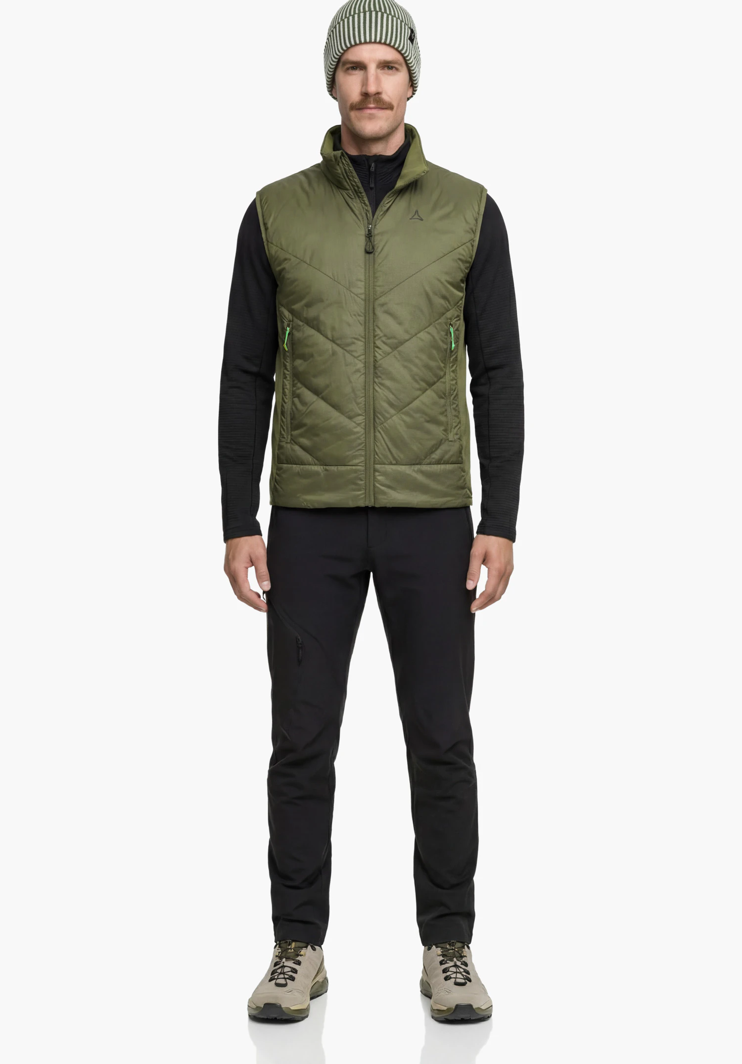 Hybrid Vt Style Cascata MNS in green with a focus on the subtle Schöffel logo on the chest and the quilted material structure, close-up shot against a white background.