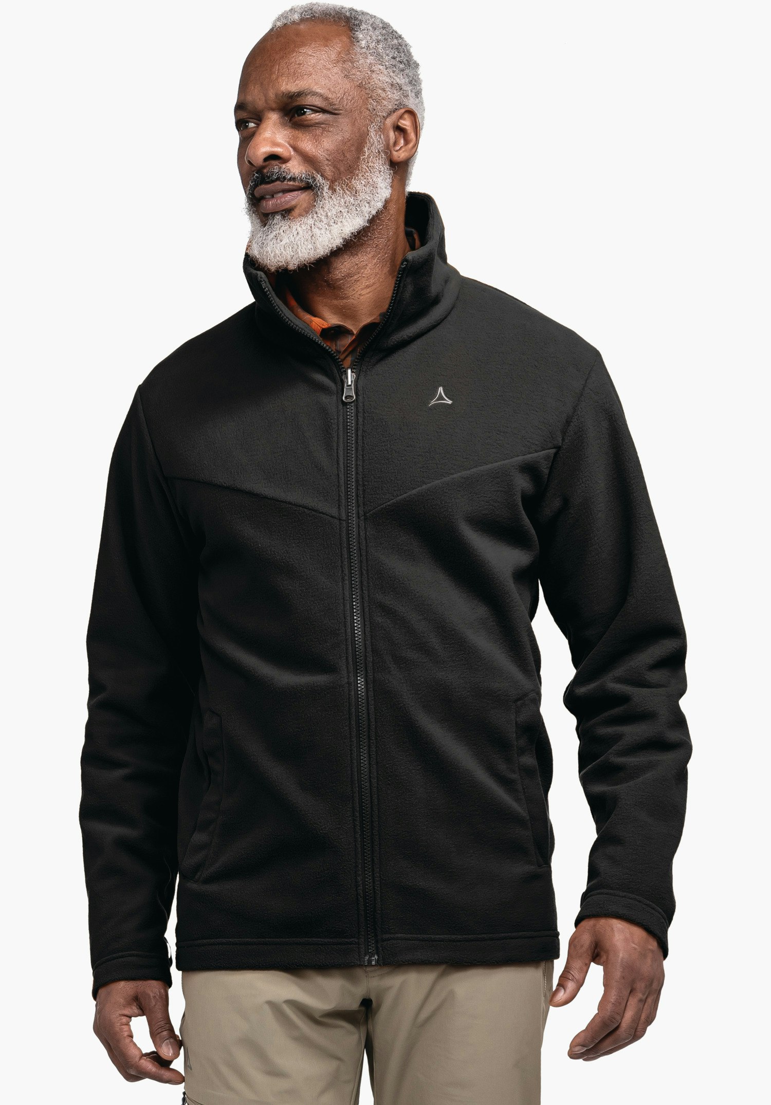 3in1 Jacket Style Okere MNS schwarze Jacke, getragen von einem Mann, der seitlich blickt; Schöffel-Logo auf der Brust; heller weißer Hintergrund.