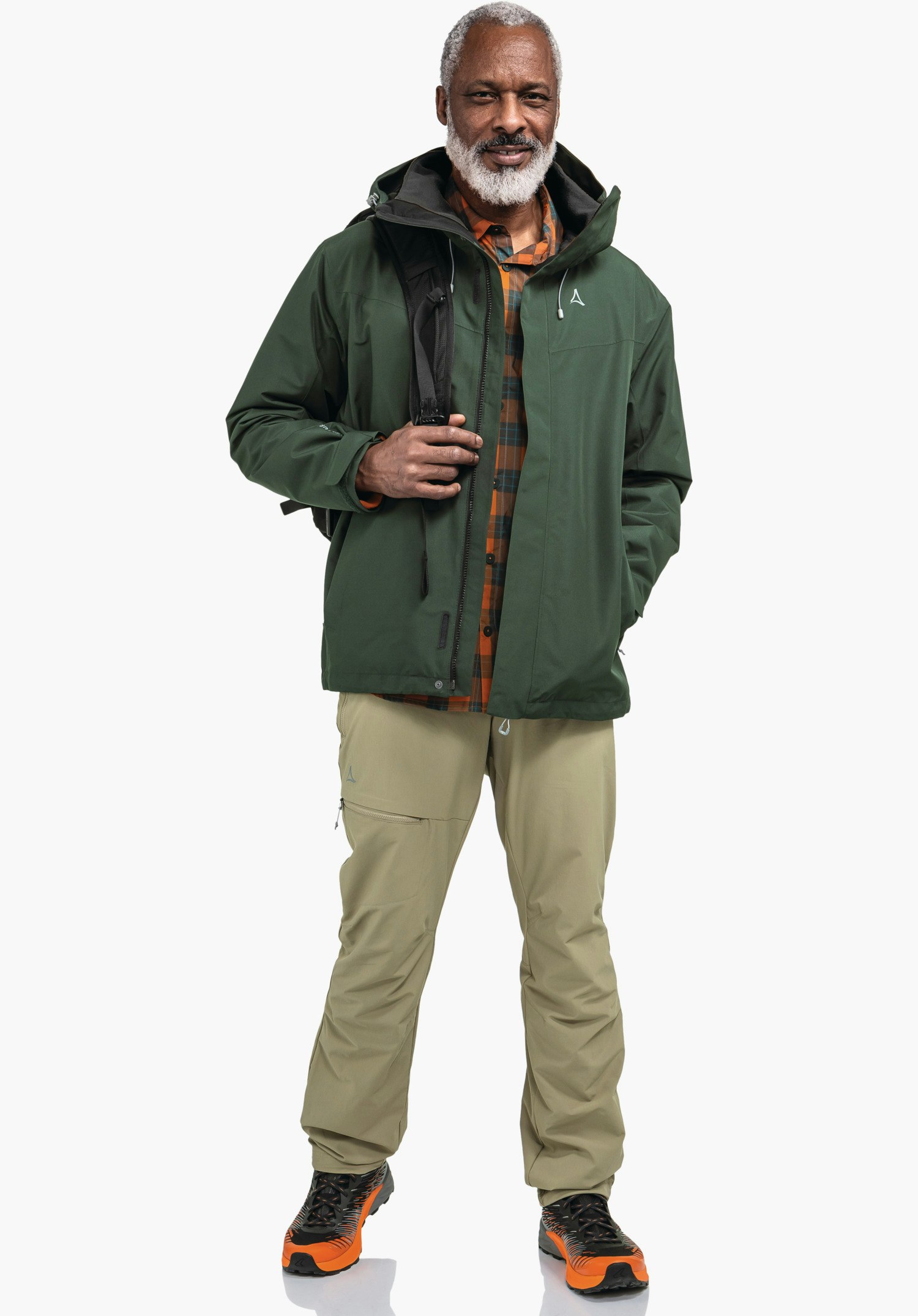 3in1 Jacket Style Okere MNS zeigt das weiße Schöffel-Logo auf der grünen Brustpartie, flankiert vom robusten Frontreißverschluss und der glatten, wetterfesten Materialstruktur. Nahaufnahme vor weißem/neutralem Hintergrund.