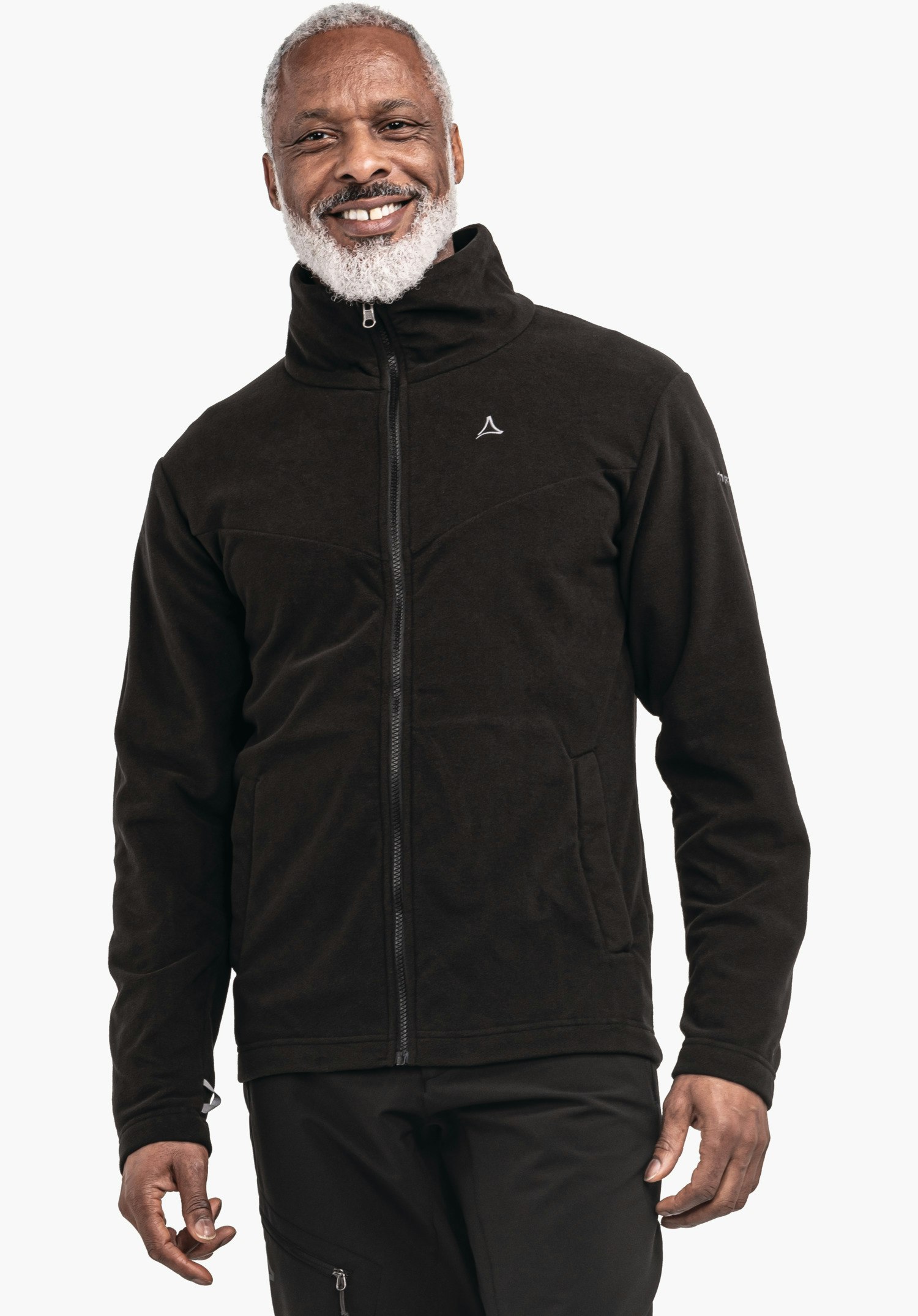 3in1 Jacket Style Okere MNS deep black fleece jacket with Schöffel logo; worn by a smiling man standing front-facing, hands relaxed at the sides; neutral light background.