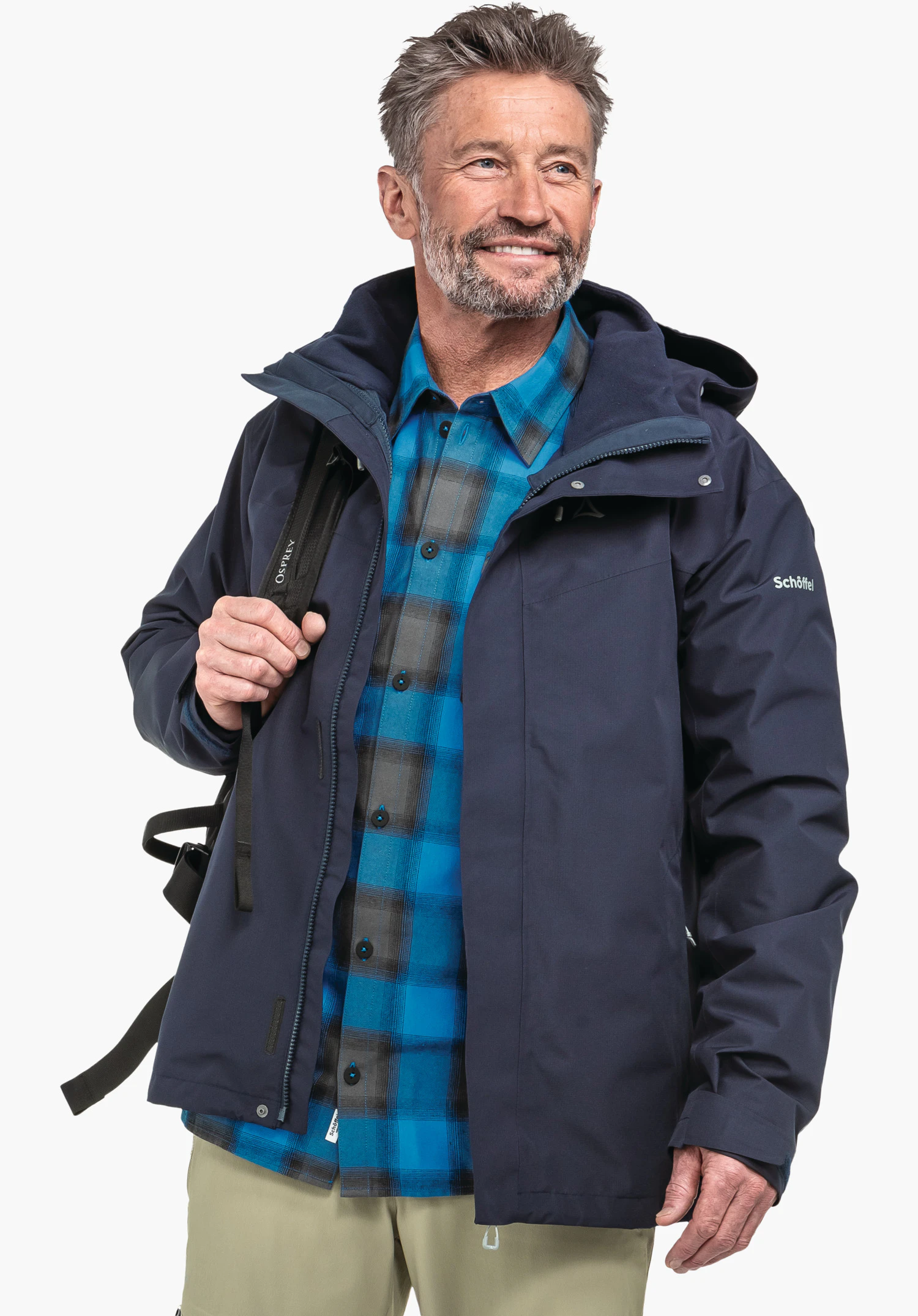 3in1 Jacket Style Okere MNS displays the white Schöffel logo on the left sleeve and the smooth texture of the blue outer fabric, close-up against a white/neutral background.