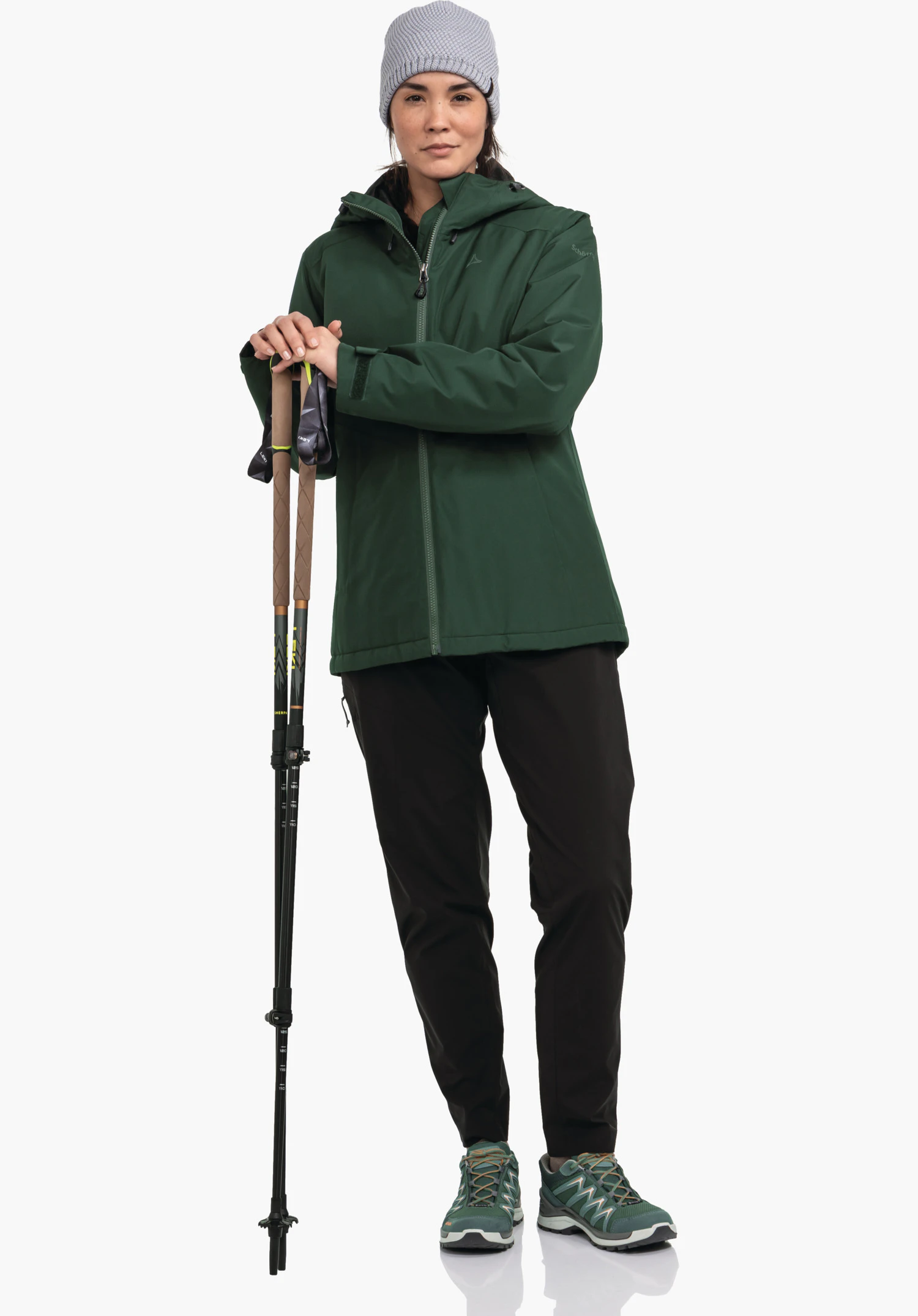 Ins Jacket Style Wildkar WMS en vert montre la fermeture éclair supérieure, la zone du col et le logo Schöffel sur la poitrine gauche. Gros plan sur fond blanc.