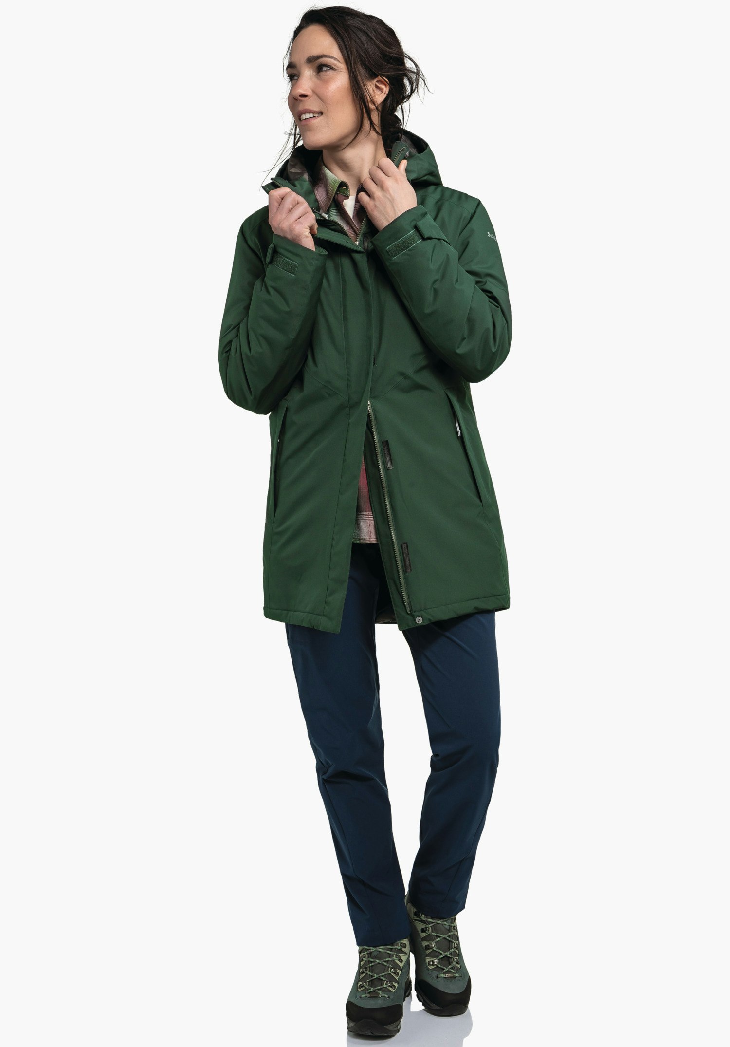 Parka Style Froda WMS, vue détaillée du tissu vert sur la manche avec le logo Schöffel visible, gros plan sur fond blanc/neutre.